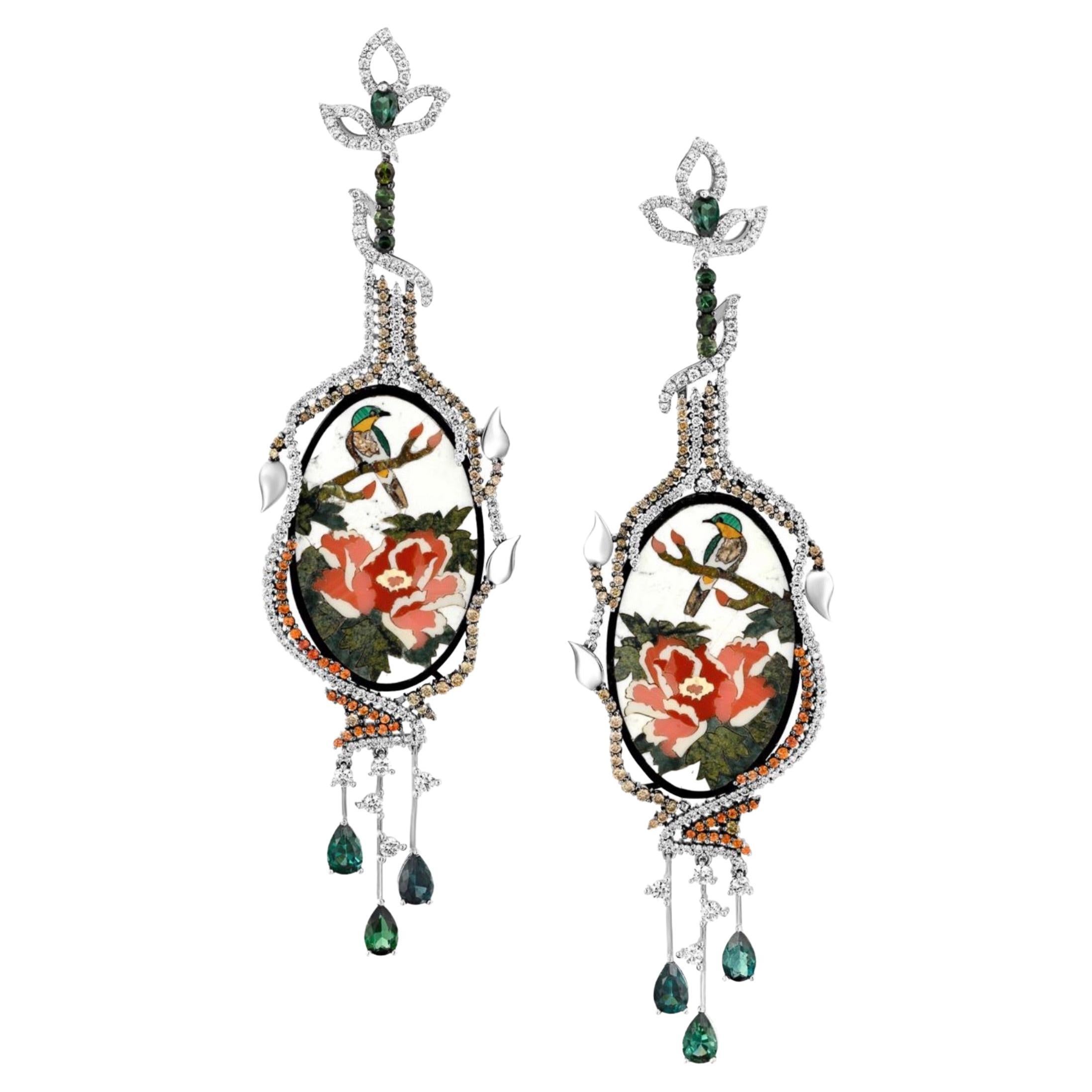 Exquisite and bold Mosaic Bird earrings shimmer with 18k Gold, Orange Sapphire, White and Champagne Diamonds and Tourmaline. 
52 Sapphires 0.46 carat 
108 cognac diamonds 0.80 carat 
16 tourmaline mix colors 4.26 carat 
256 white diamonds 2.32 carat