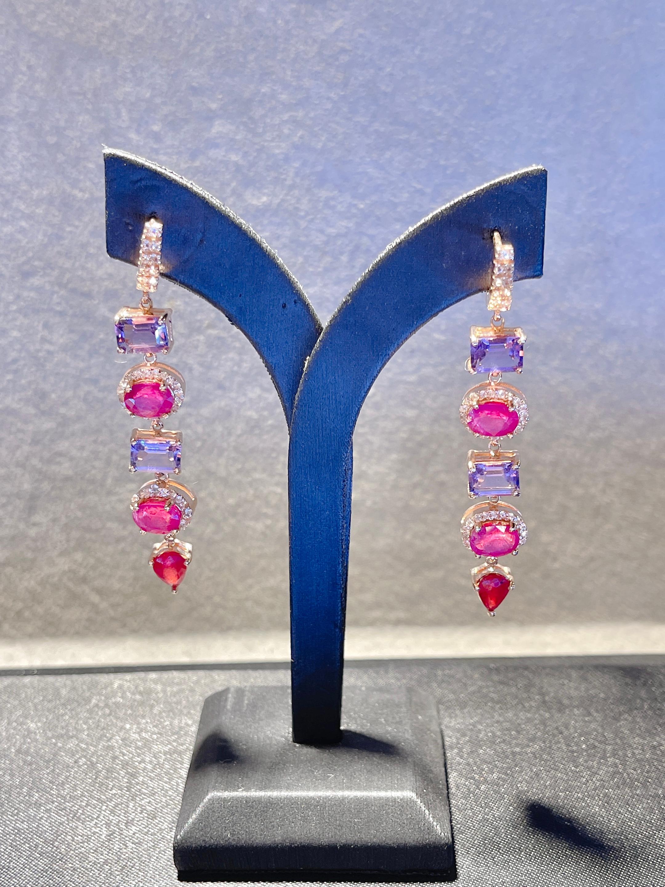 Bochic Multi color Sapphire and Ruby Drop Earrings
Purple Sapphire / Natural 
Pink Sapphire / Natural 
Ruby / Natural 
White Topaz / Natural 
25 carats 
22 Gold and Silver 
This earrings are perfect to wear day to night by 
Day to night, swim wear
