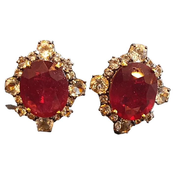 Bochic 11 Carat African Natural Ruby & Rose Cut Topaz  Earrings 
Natural African Ruby Gem Cut - 11 carat 
Shape - Oval shape 
Color - deep wine 
White Topaz Rose cut Natural White Topaz - 5 carat 
Rose cuts 
Cluster Rose cut setting 
18 K Gold and