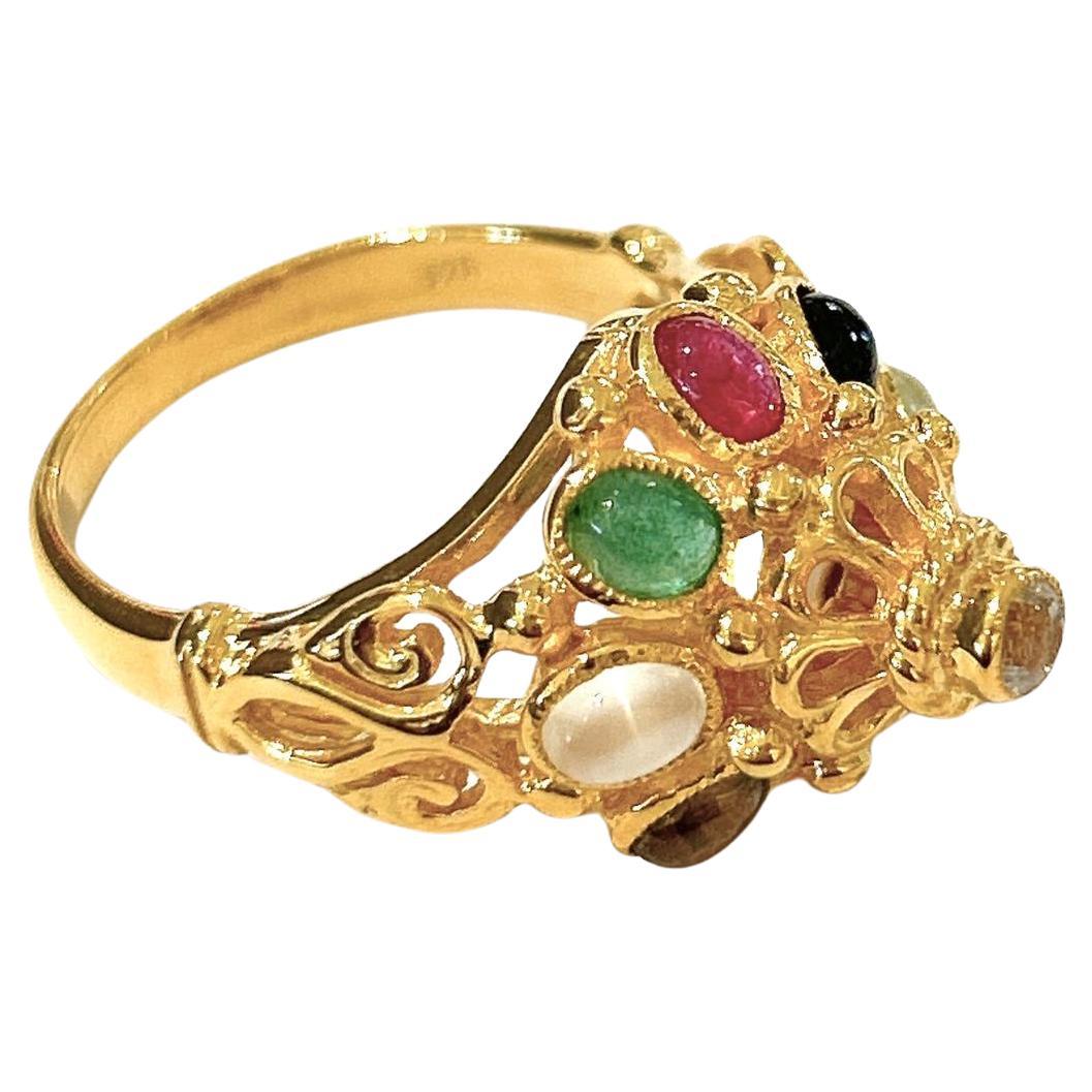 Bochic “Orient” 9 Gem Ring Set In 18K Gold & Silver 
Ruby 
Emerald 
Sapphire 

This Ring is from the 