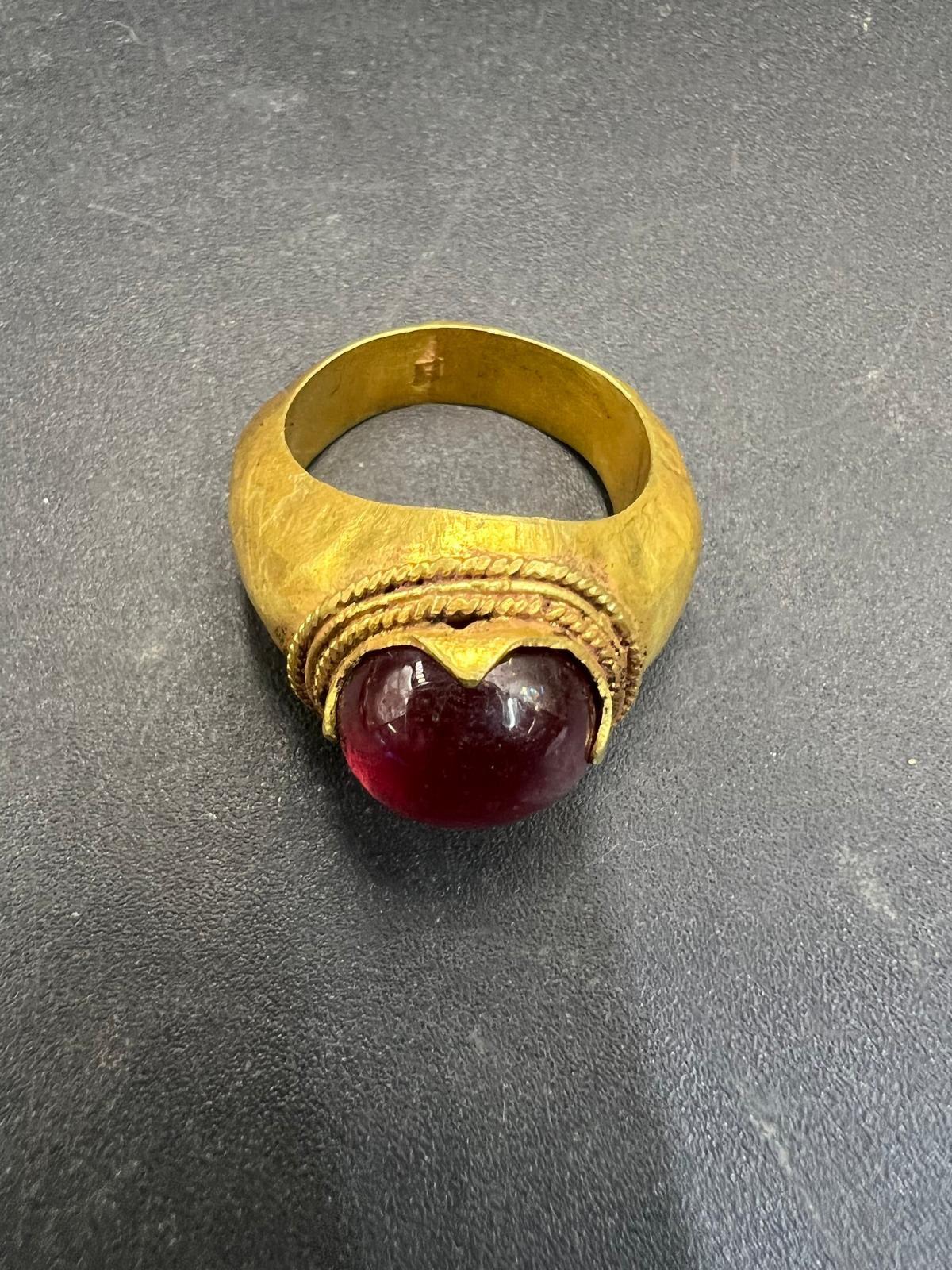 Bochic Curated Antique Ring From Burma 18k Solid Gold & Ruby

This is the kind of ring you see in a Museum
South East Asian Antique Agate Gem Old Burmese Pyu Pagan Gold Ring

Natural Ruby - 2 carats 

This Ring is from the 