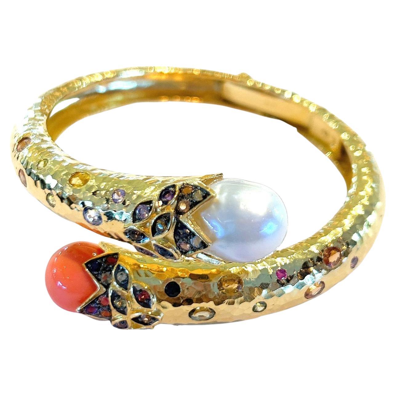 Bochic “Orient” Bangle set 22K Gold & Silver with Pearls & Coral and Sapphires 
White South Sea pearls white color, silver tone 
Natural Multi Color Sapphire from Sri Lankan  - 3 carats 
Sapphire colors, Red, Orange, Blue, Yellow and Pink
Set in 22K