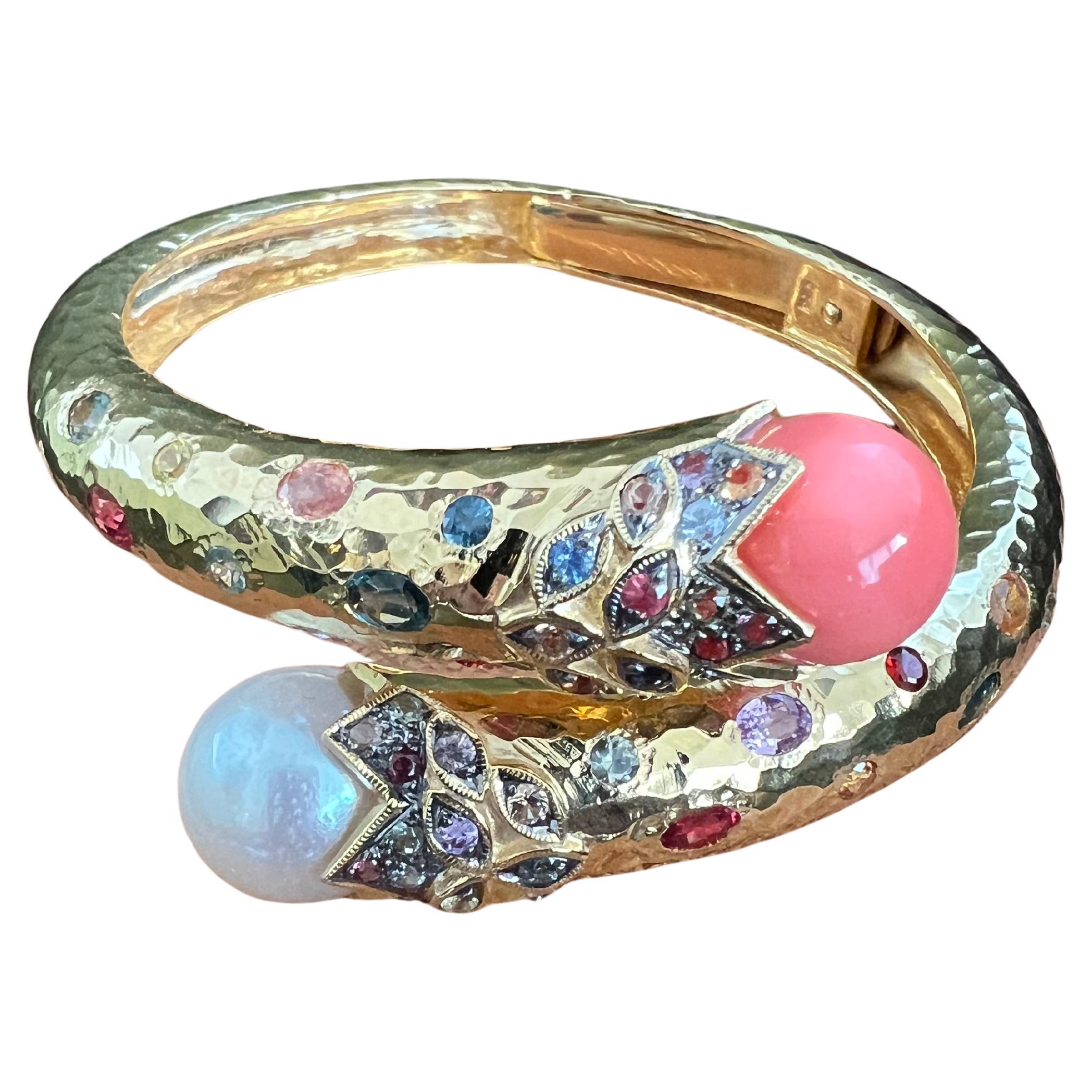 Bochic “Orient” Bangle set 18K Gold & Silver with Salmon Coral & Sapphires & South Sea Pearls 

South Sea Pearl white pearl with cream tone 
Natural Multi Color Sapphire from Sri Lankan  - 4 carats 
Sapphire colors, Red, Orange and Pink
Set in 18K
