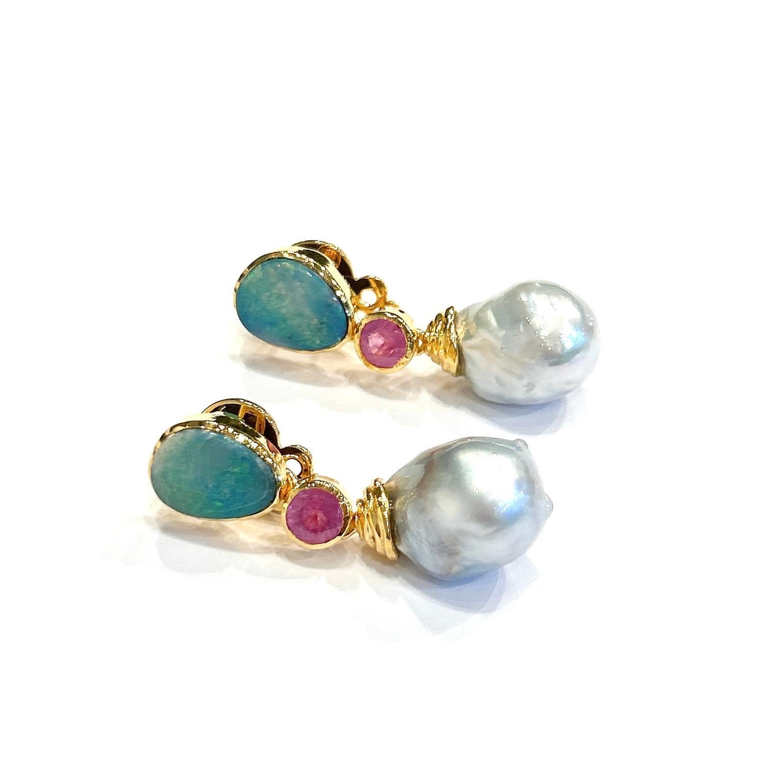 Bochic “Orient” Blue Opal, Pearl & Pink Ruby Earrings Set 18K Gold & Silver

Natural Blue Opal - 2.00 carats 
Natural Ruby -2.00 carats 
White Barque Pearls 

The earrings from the 