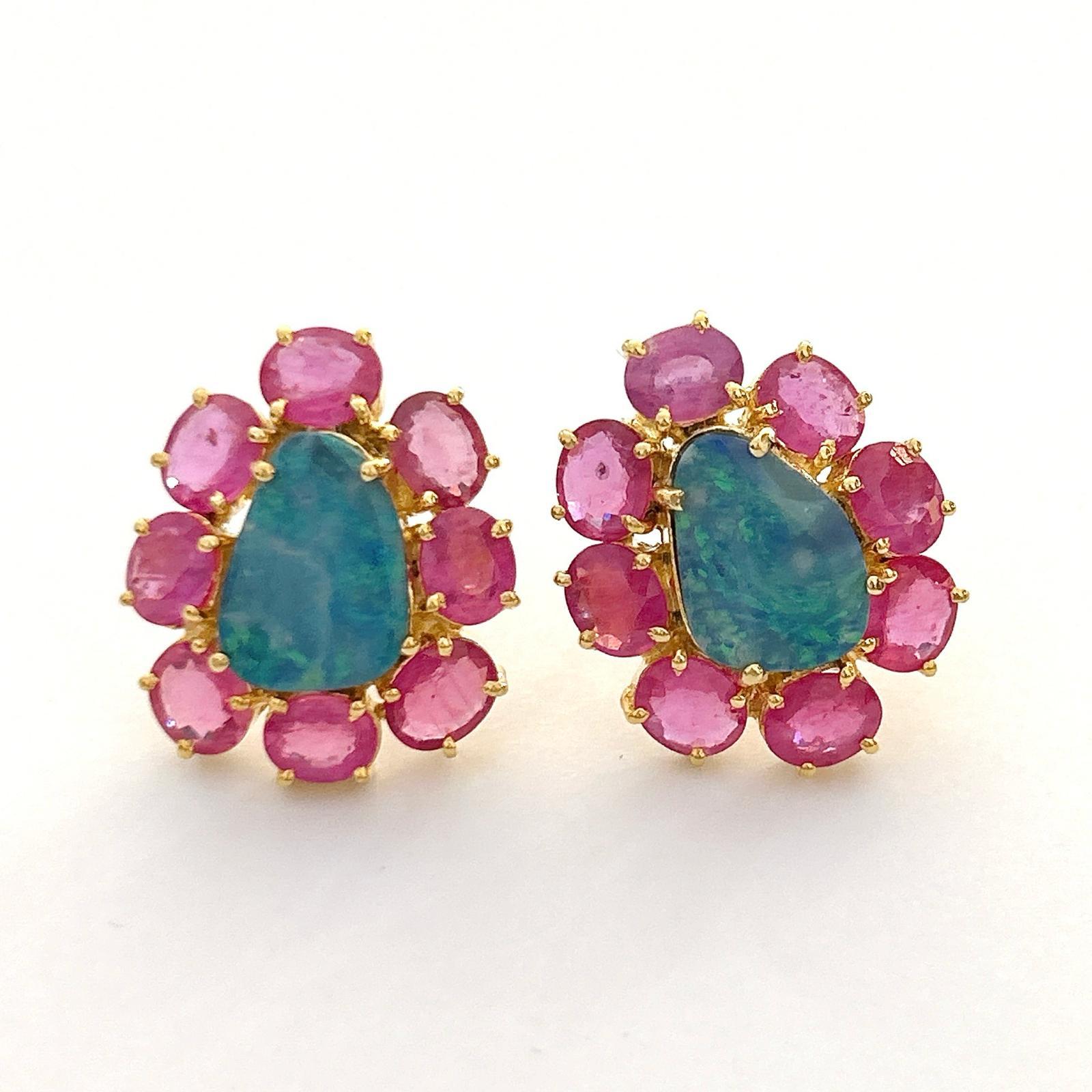Bochic “Orient” Blue Opal & Red Ruby Earrings Set In 18K Gold & Silver 

Oval Cut Natural Ruby Pinkish Red Color  - 6 Carats 
Blue Opals - 14 Carats 

The earrings from the 