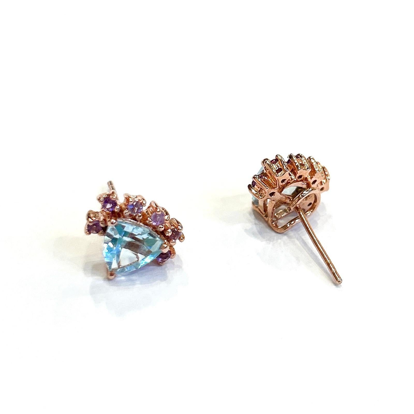 Bochic “Orient” Blue Topaz Trillions & Amethyst Earrings Set 18K Gold & Silver 

Natural Trillion shape Blue Topaz - 3.50 carat 
Natural Amethyst - 1.50 carat

The earrings from the 
