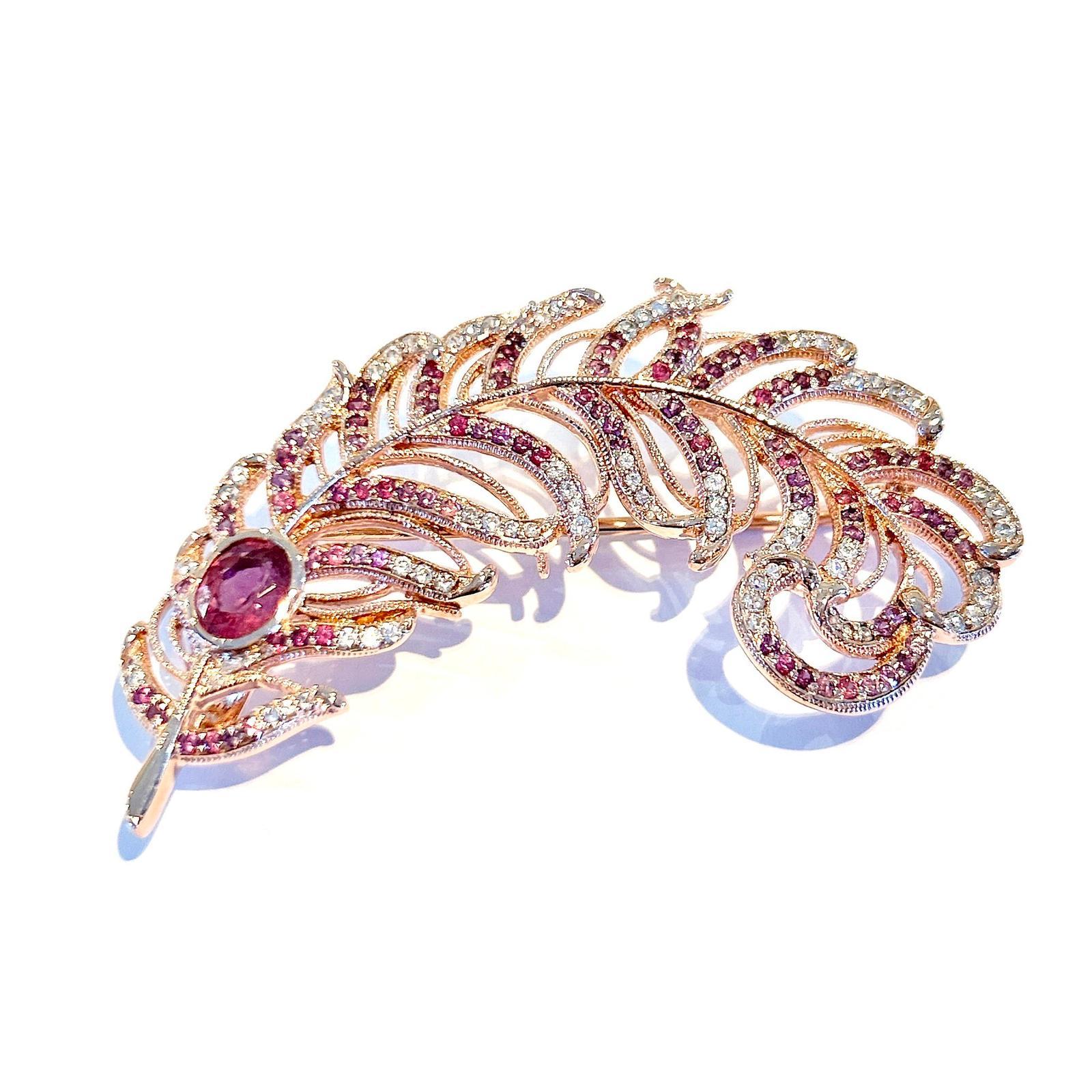 Bochic Brooch 
Style “Orient”
Natural Deep Wine Oval shape  Rodorite - 9 carats, set in the center 
Mix Natural Pink Sapphire from Sri Lanka, White Topaz and Deep wine Rodorite round brilliant gems 
Approx carat weight - 14 
Set in 22K Pink Gold and