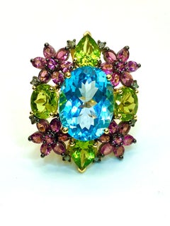Anello Bochic "Orient" con diamanti, peridoto, ametista e topazio blu, 18 carati e argento