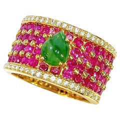 Anello vintage Bochic "Orient" con diamanti, rubini e giade, in oro e argento 18 K.