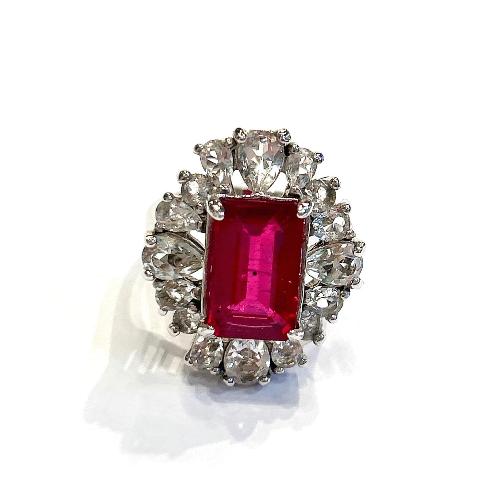 Bochic “Orient” Emerald Cut Ruby & White Topaz  Ring Set In 18K Gold & Silver 

Natural Red Ruby, Emerald Cut 
7.50 Carat 
Natural Rose Cut White Topaz 
2.40 Carat 

This Ring is from the 
