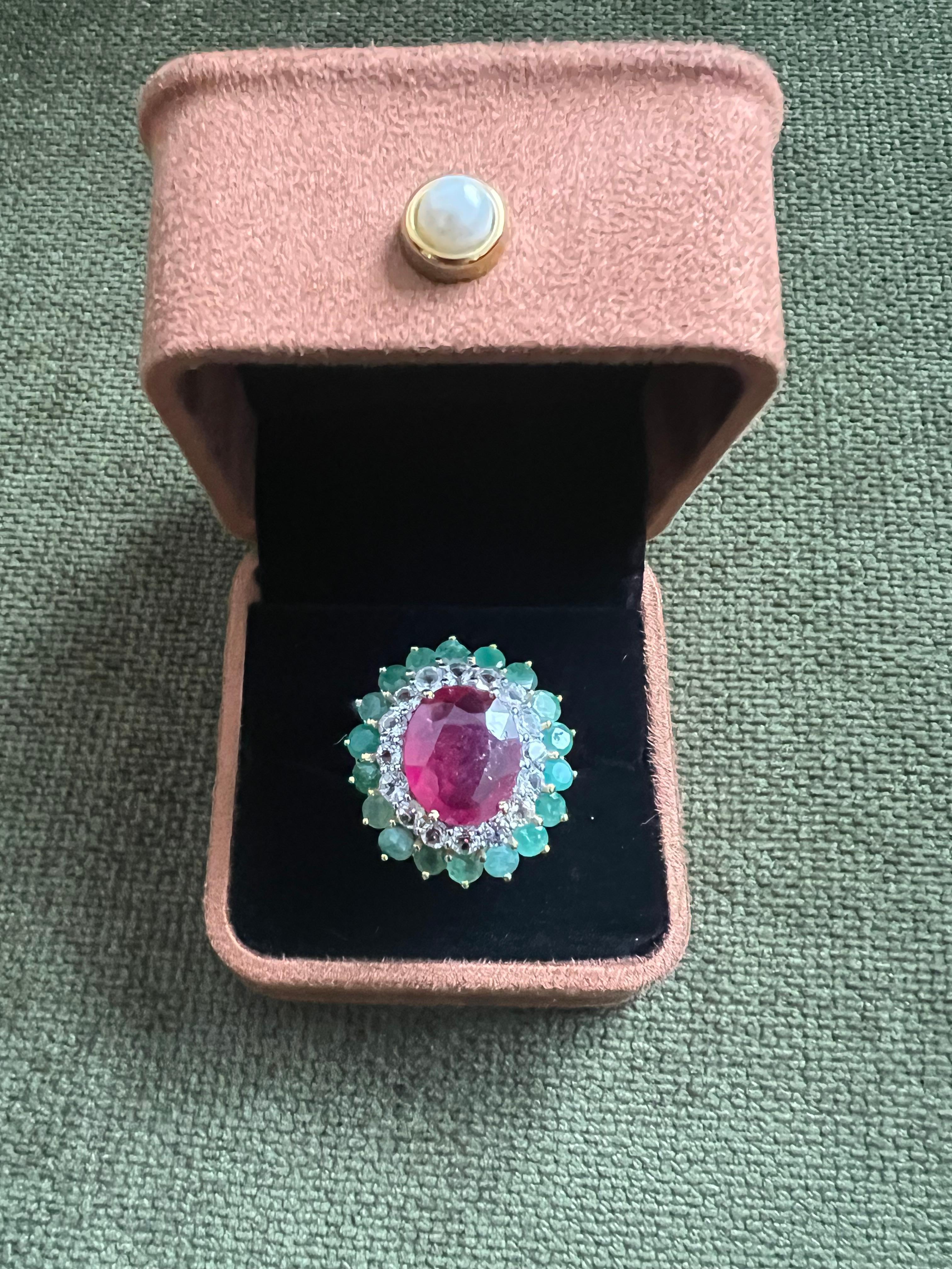 Bochic “Orient” Emerald, Sapphire & Topaz  Ring Set In 18K Gold & Silver 

Natural Red Ruby, Oval Cut 
7.50 Carat 
Natural Green Emeralds from Zambia, Round Cut
2.00 Carat 
Natural Rose Cut White Topaz 
2.40 Carat 

This Ring is from the 