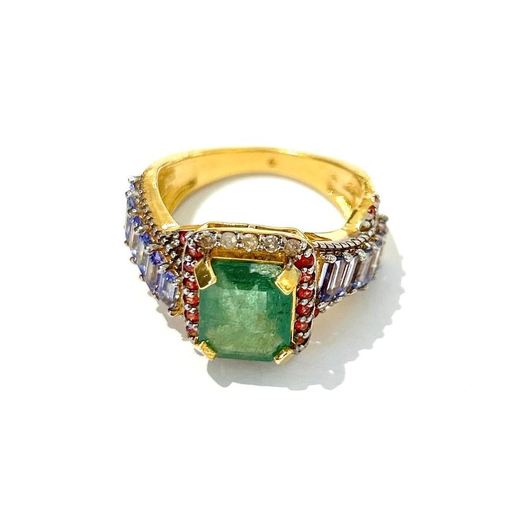 Bochic “Orient” Emerald, Tanzanite & Diamond  Ring Set In 18K Gold & Silver 

Natural Emerald from Zambia - 1.60 Carat 
Slice cut 
Natural Tanzanite from Tanzania - 3 Carat 
Emerald cuts 
Natural Ruby from Burma - 0.40 Carat 
Natural Diamonds - 0.40