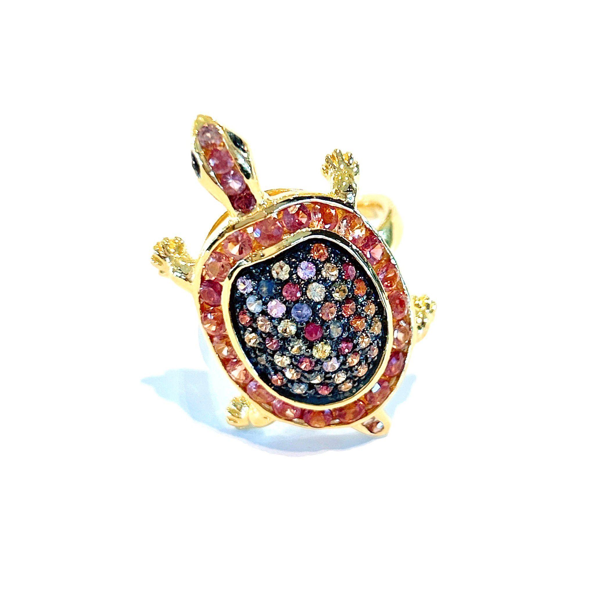 Bochic “Orient” Cocktail Ring 
Natural Beautiful Sri Lankan Sapphires - 11 carats
Shape - Round brilliant 
Colors - Orange, Green, Rose, Blue, Red, Pinl
Set in 22K Gold and Silver 950
This Ring is perfect to wear - Day to night, swim wear to evening
