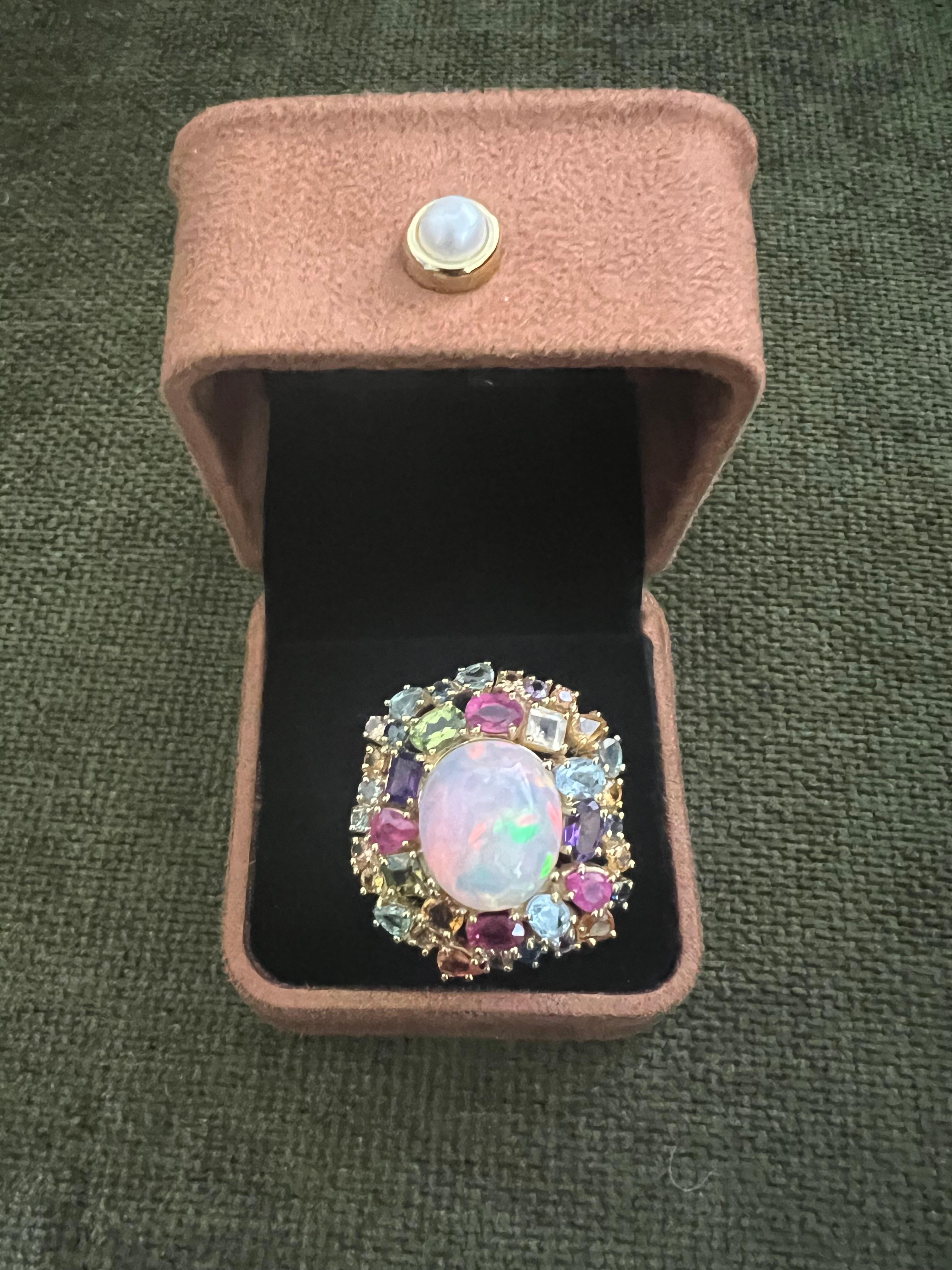 Bochic “Orient” Fire Opal, Multi Gem & Sapphire Ring Set In 18K Gold & Silver


Natural Fire Opal - 12 carats 
Natural Fancy Sapphires - 2.50 carats 
Natural Blue Topaz, Citrine, Amethyst 
4 carats 
22.3 gram 

This Ring is from the 