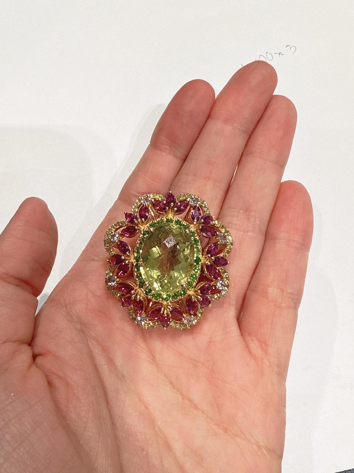 Bochic “Orient” Green Amethyst & Multi Gem Cocktail Ring 18K Gold & Silver 

Natural Green Amethyst   - 8 Carat
Natural Rose Rodorite - 4  Carat 
Natural Green Tsavorite - 2 Carat 
Natural White Topaz - 1 Carat 

This Ring is from the 