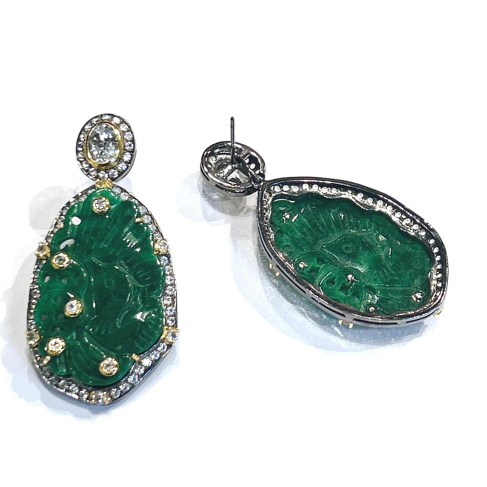Bochic “Orient” Green Jade & White Topaz Earrings set In 18K Gold & Silver 

Natural White Topaz - 4 carats 
Green Jade 

The earrings from the 