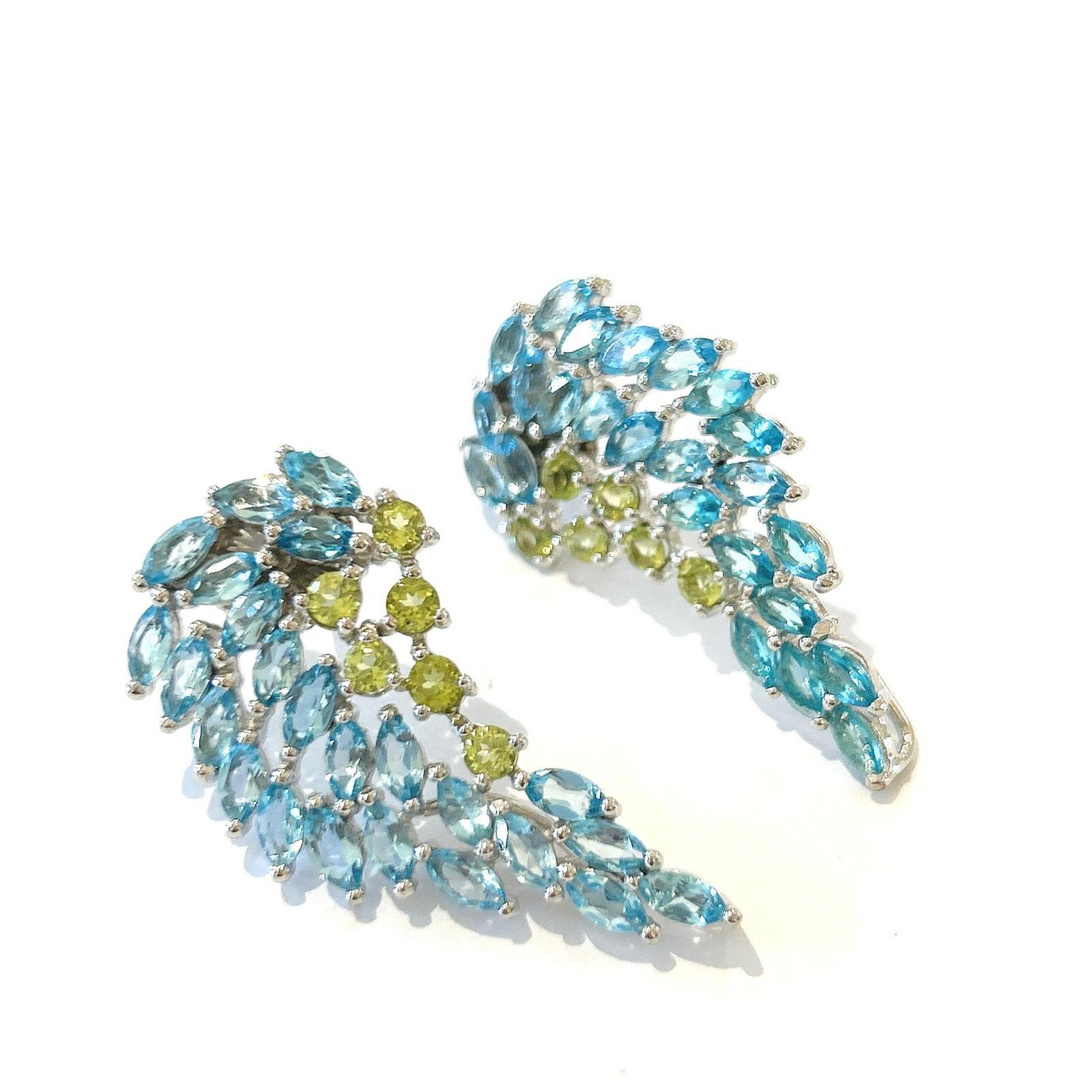 Bochic “Orient” Green Peridot & Blue Topaz Set 18K In Gold & Silver Earrings


15 carats 
Natural Blue Topaz
5 carats 
Natural Peridot


The earrings from the 