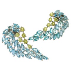 Pendientes Bochic "Orient" Peridoto verde y topacio azul engastados en oro y plata de 18 quilates