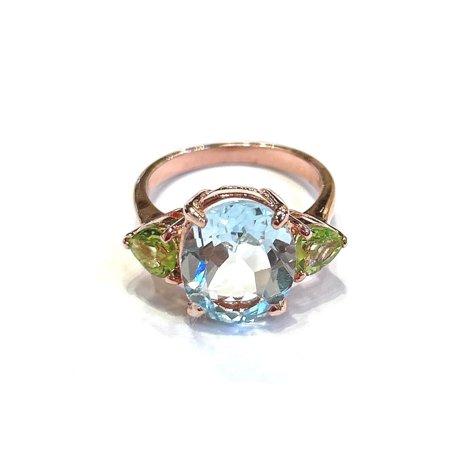 Art Deco Bochic “Orient” Green Peridot & Oval Blue Topaz Ring Set In 18K Gold & Silver For Sale