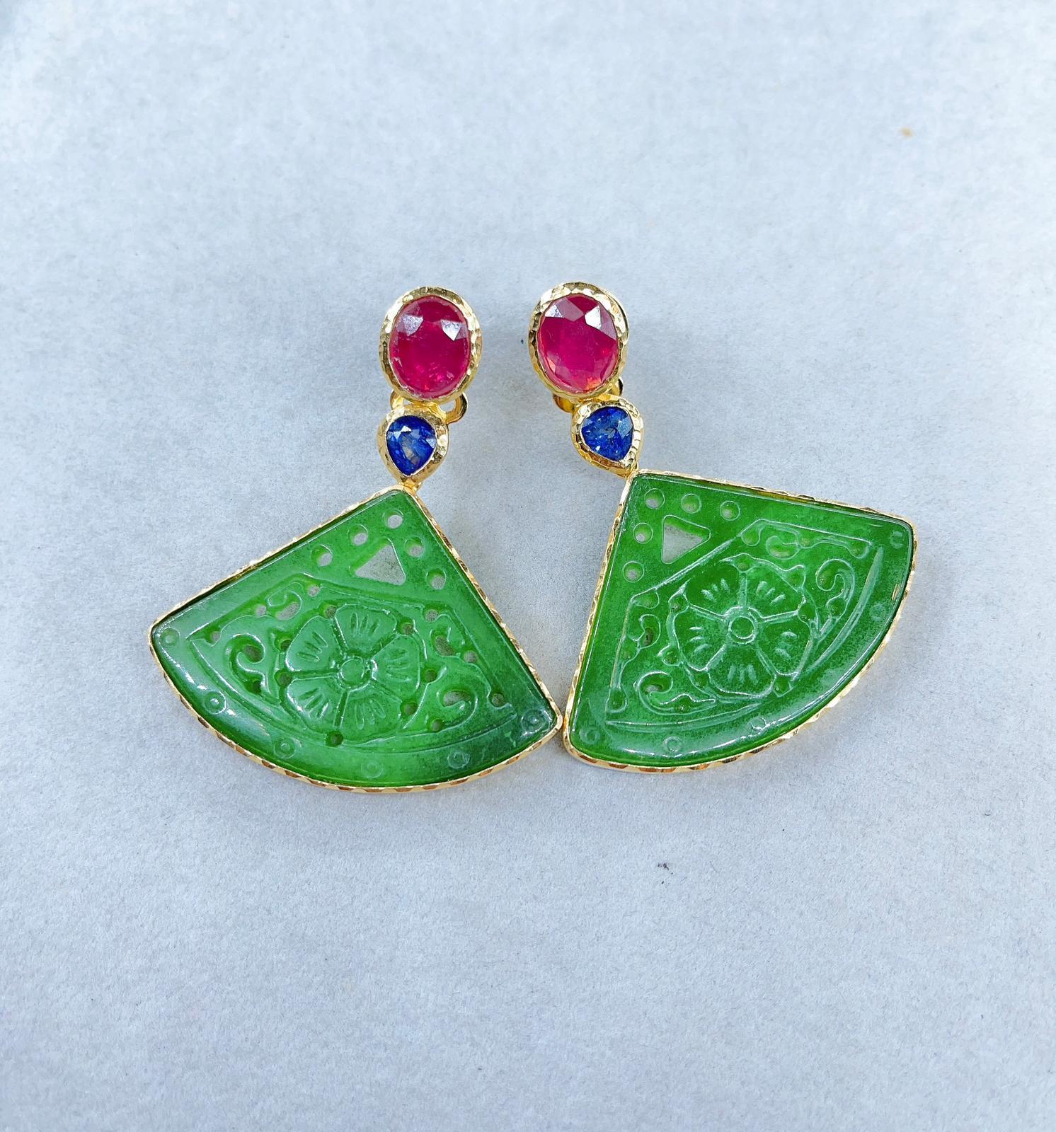 Bochic “Orient” Green Jade Earrings & Blue Sapphire & Ruby Set 22K Gold, Silver 
Bochic “Orient” Multi Natural Gem Earrings 
Natural Ruby, Color - Red - 5 Carats 
Shape - Cabochon 
Natural Sapphire, Color - Blue - 3 Carats 
Shape - Cabochon
Set in