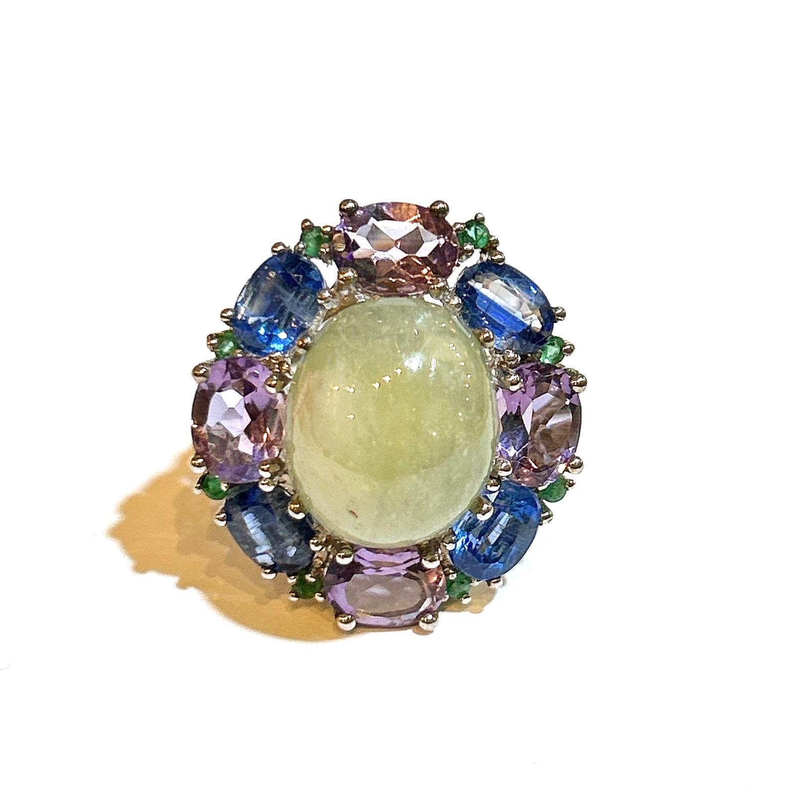 Bochic “Orient” Lemon Sapphire & Multi Gem Cocktail Ring In 18K Gold & Silver 

Natural Lemon Sapphire Cabochon - 7 Carat 
Natural Tanzanites - 4 Carat
Natural Amethyst - 4 Carat 
Natural Emeralds - 1 Carat 

This Ring is from the 