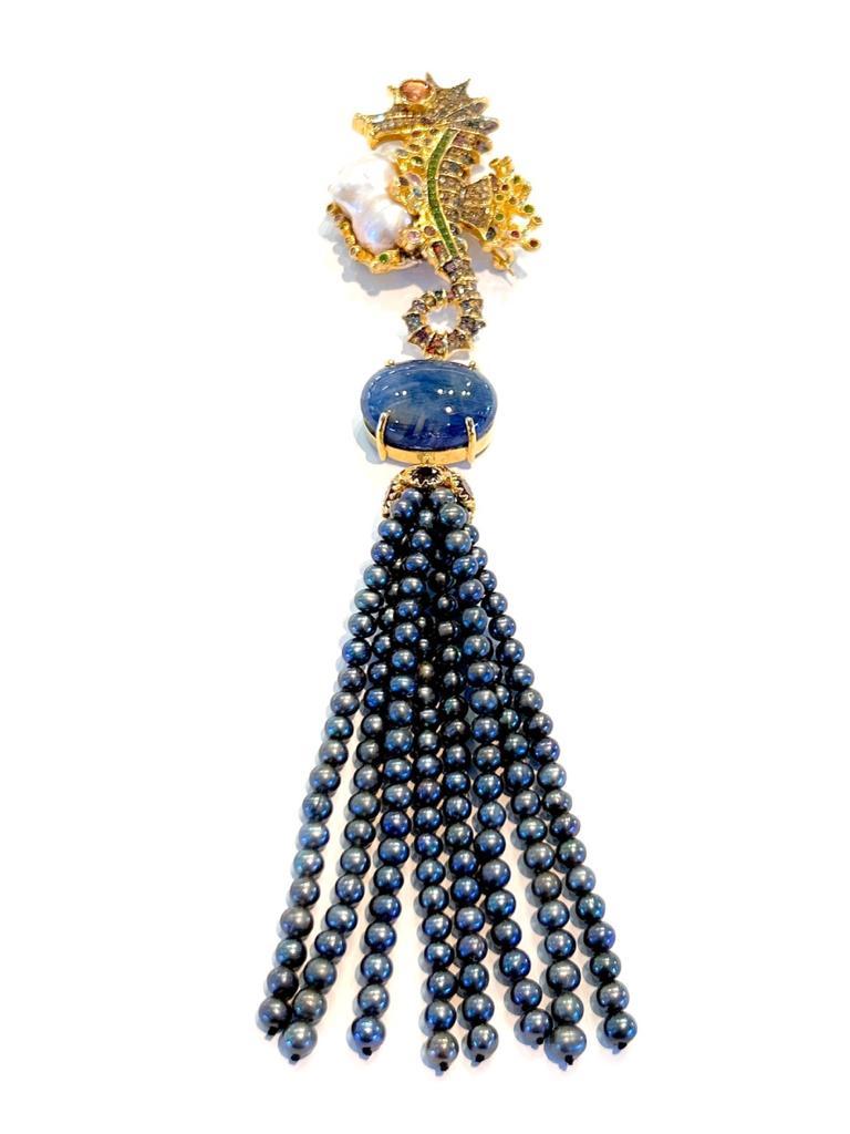 Bochic “Orient” Multi Sapphire & Black Pearl Brooch Set In 18K Gold & Silver 
Beautiful Natural Blue Sapphire Cabochon Shape - 24 Carats 
Natural Multi color sapphires from Sri Lanka - 3 Carats 
Black Pearls 
You can wear as a brooch or a pendant