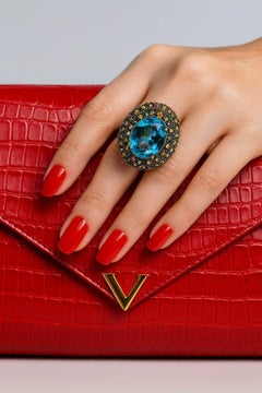 Bochic "Orient" Bague en or 18 carats et argent sertie de saphirs multiples et de topazes bleues