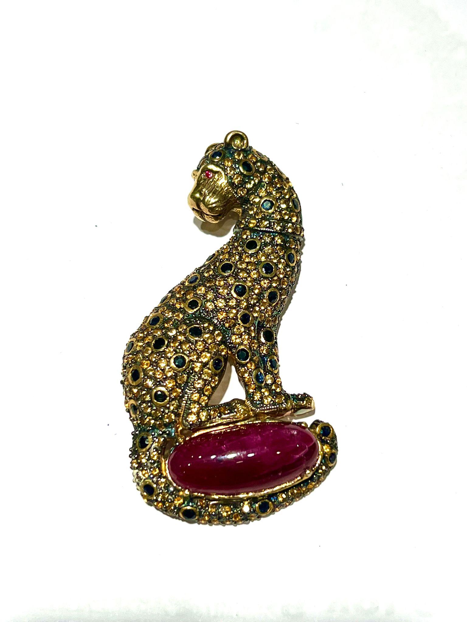 Bochic “Orient” Multi Sapphire & Center Ruby Brooch or Pendent Set In 18K Gold & Silver 

Natural Multi Sapphire 
3 carats 
Natural Green Calcite 
15 carats 

Can be worn as a pendent as well. 

The Brooch is from the 