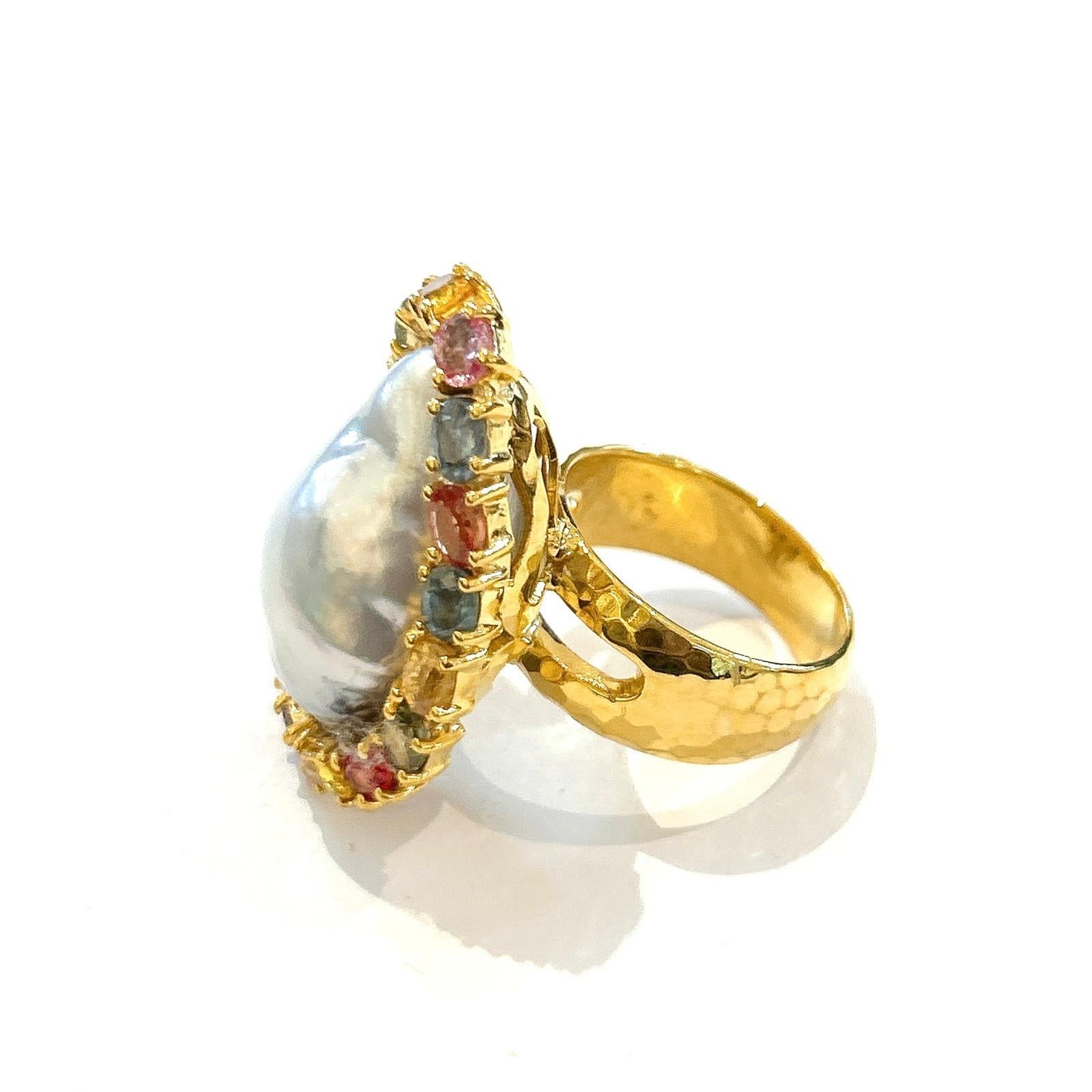 Bochic “Orient” Multi Sapphire & Pearl Cocktail Ring Set In 18K Gold & Silver 

Natural Multi Color Fancy Sapphires Oval Shape 
4 carats 
Colors: Blue, Pink, Yellow, Green and Red
White South Sea Pearl with Pink and Silver tone 

This Ring is from