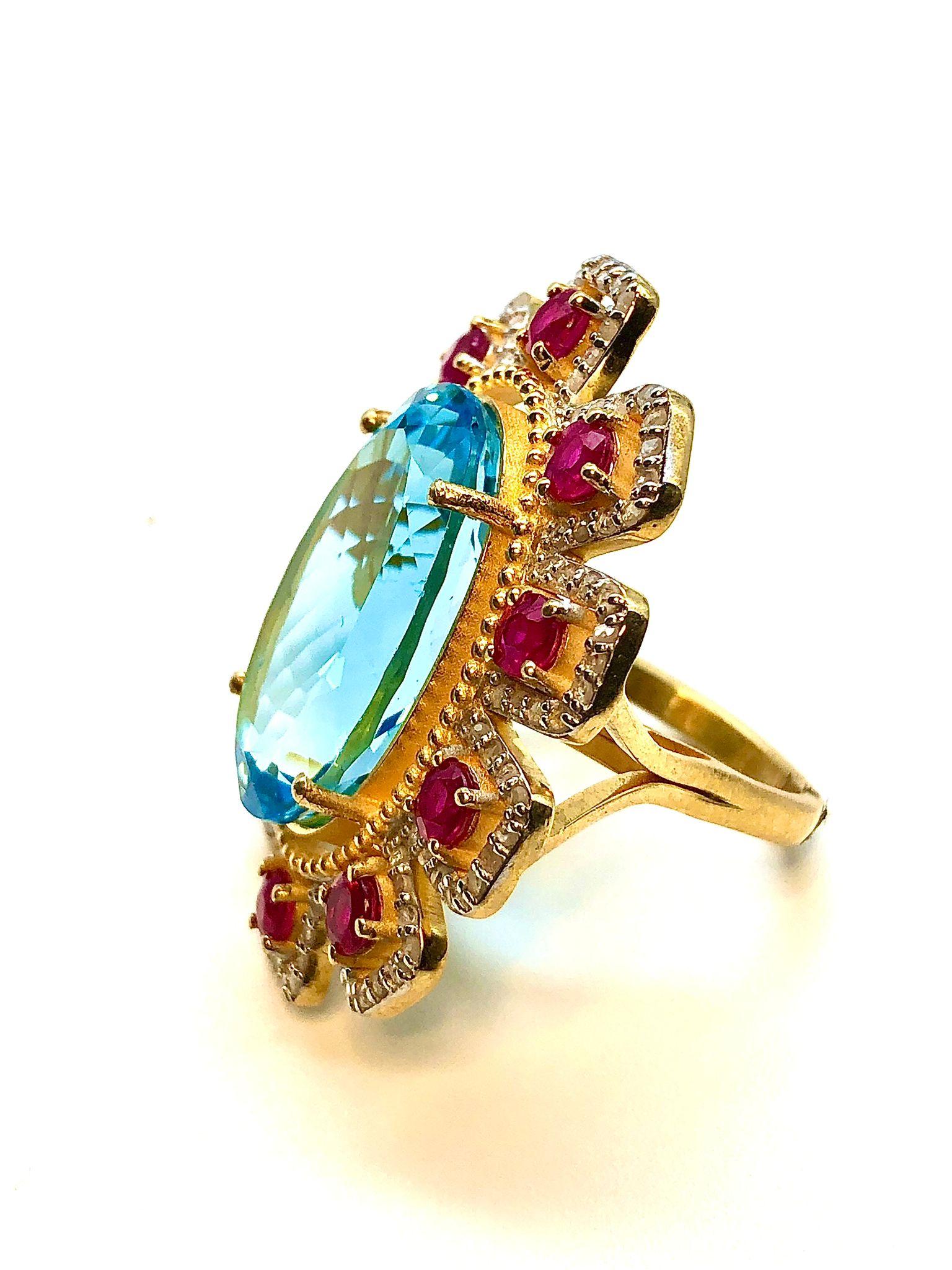 Baroque Bague Bochic Orient en or 18 carats, rubis africain naturel, topaze bleue et diamant en vente