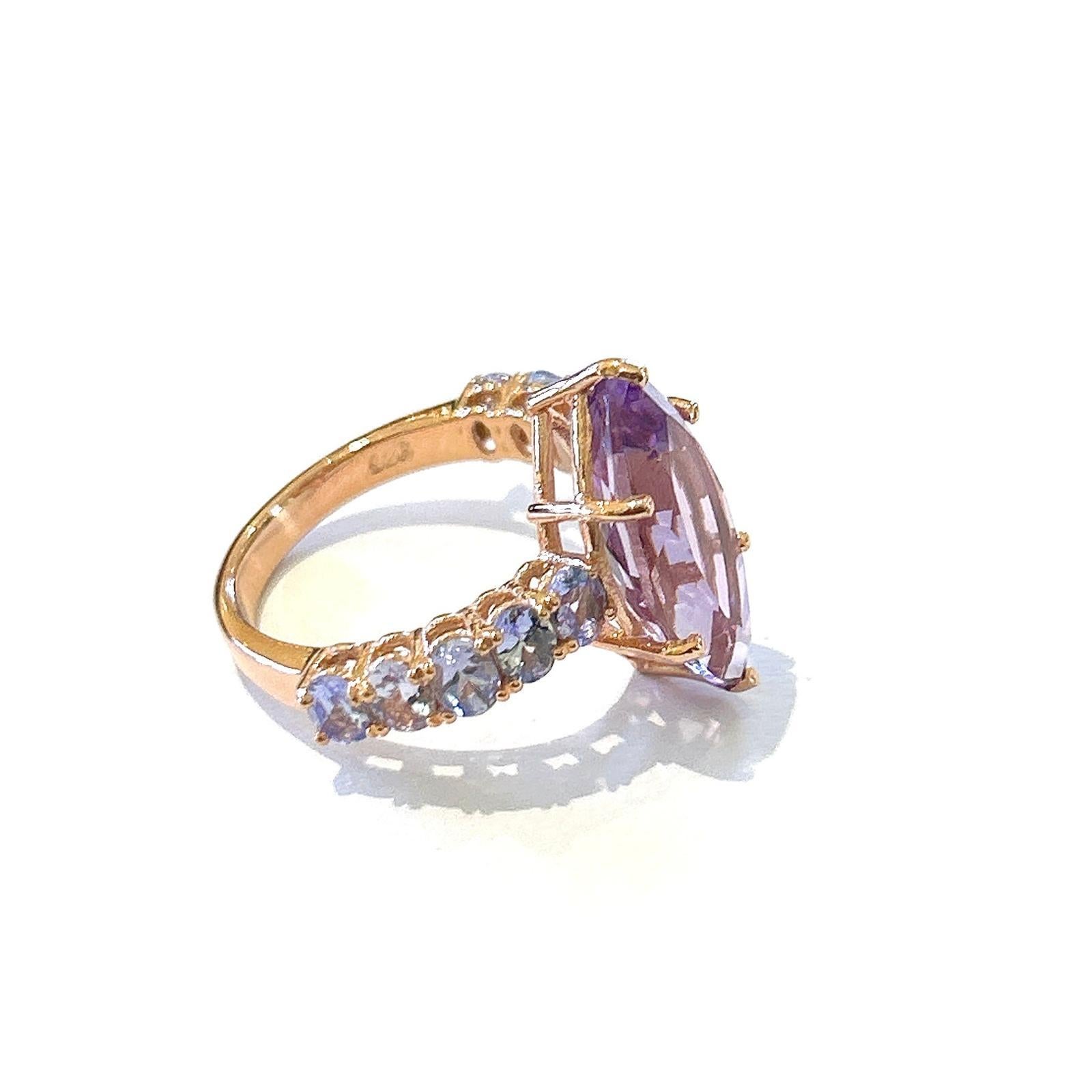Bochic “Orient” Amethyst & Lilac Tanzanite Ring Set In 18K Gold & Silver 

Natural Marquee Shape Amethyst - 4.50  carats 
Natural Round Shape Lilac Tanzanite - 2.50  carats

This Ring is from the 