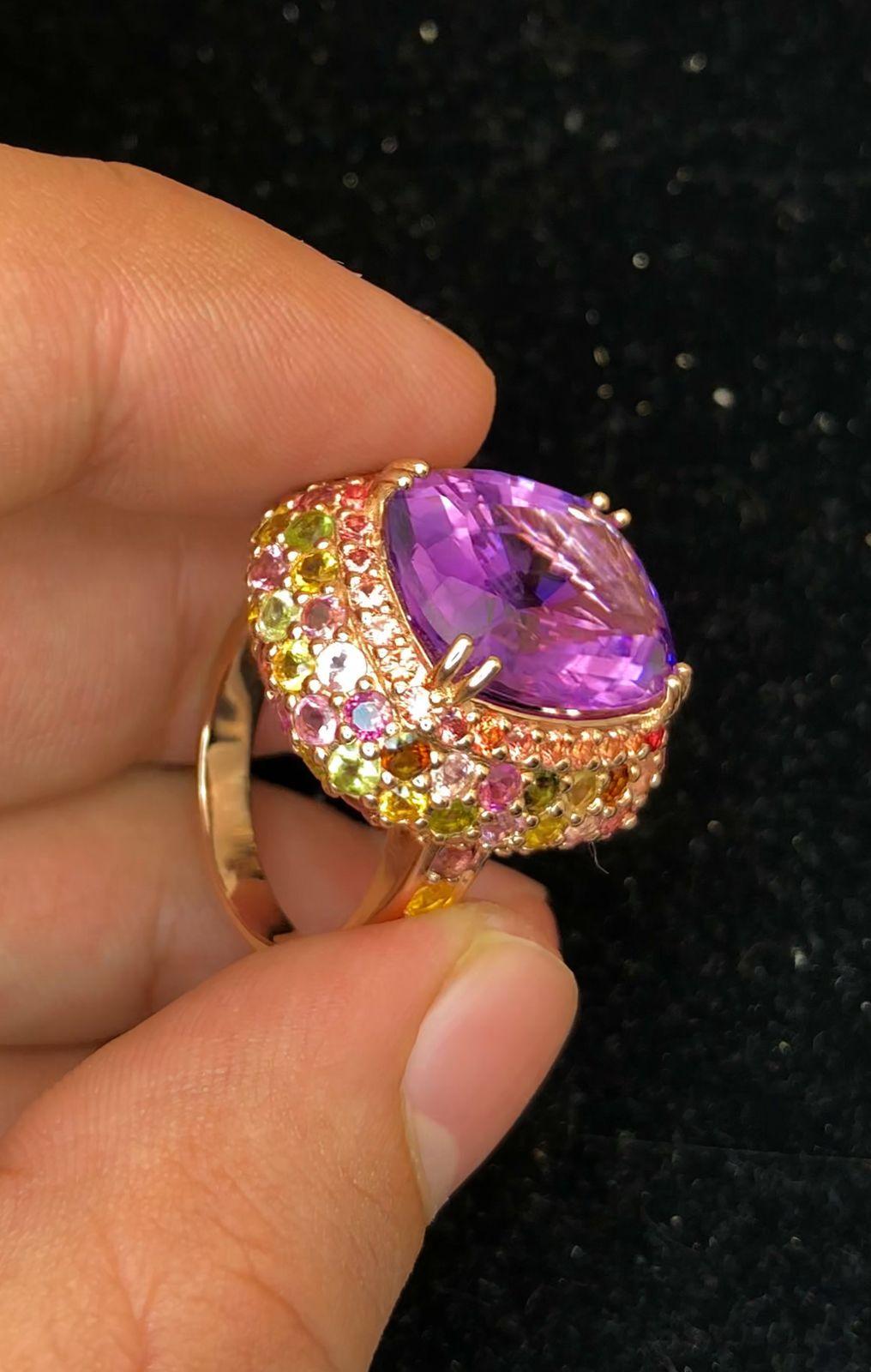 Bochic “Orient” Natural Amethyst & Multi Sapphire Ring Set In 18K Solid Gold 

Natural Amethyst  - 7.50 Carat 
Natural Round Brilliant Multi Color Fancy Sapphire  
4.00 Carat 
Natural Red Spinal - 1.00 Carat 

This Ring is from the 
