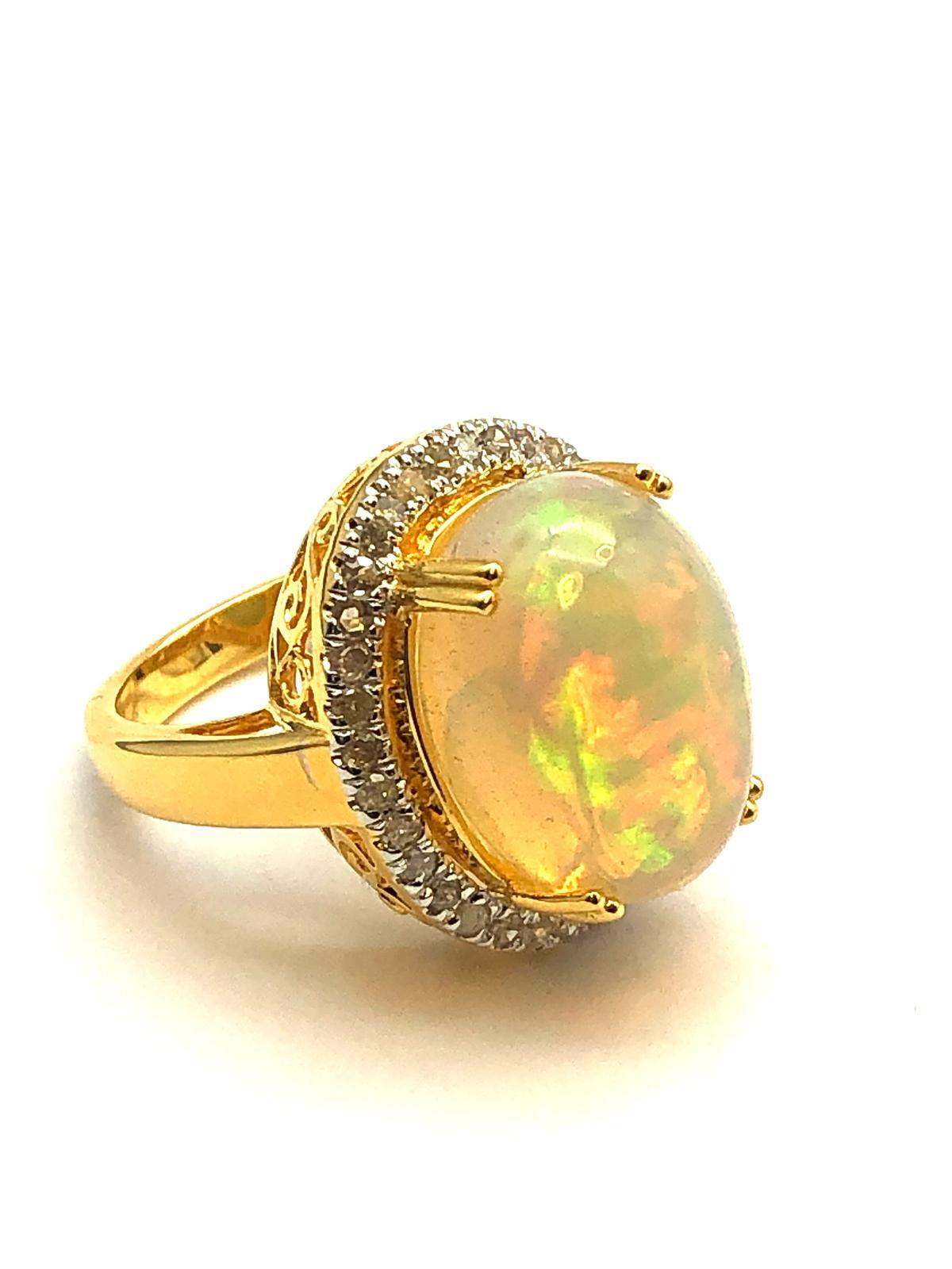 Bochic “Orient” Natural Diamond & Fire Opal Ring Set In 18K Gold & Silver 

Natural Fire Opal - 9.50 Carat 
Natural Round Brilliant Cut Diamonds
2.00 Carat

This Ring is from the 