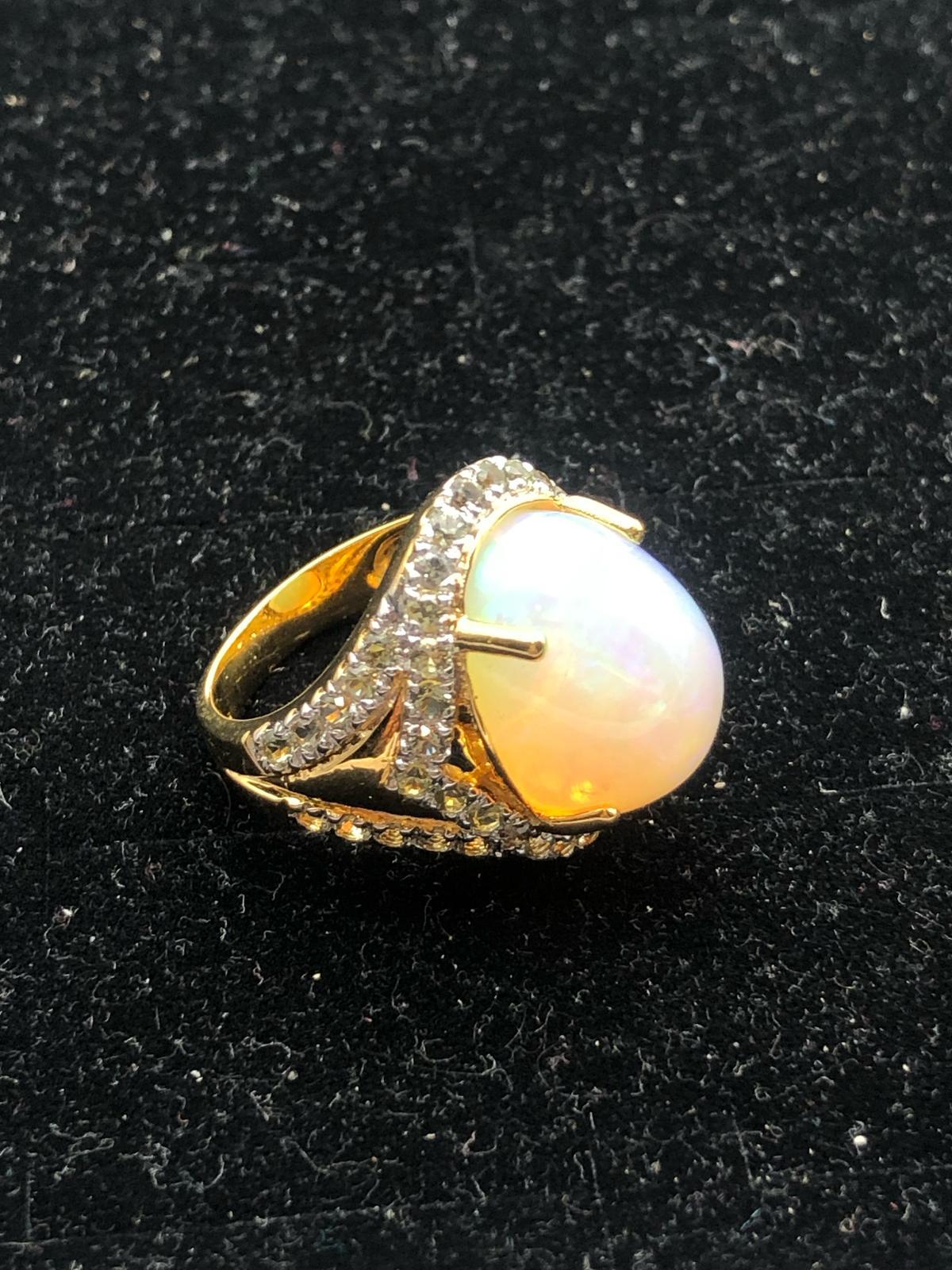 Bochic “Orient” Natural Diamond & Pink Opal Ring Set In 18K Gold & Silver 

Natural Fire Opal - 9.50 Carat 
Natural Round Brilliant Cut Diamonds
2.00 Carat

This Ring is from the 
