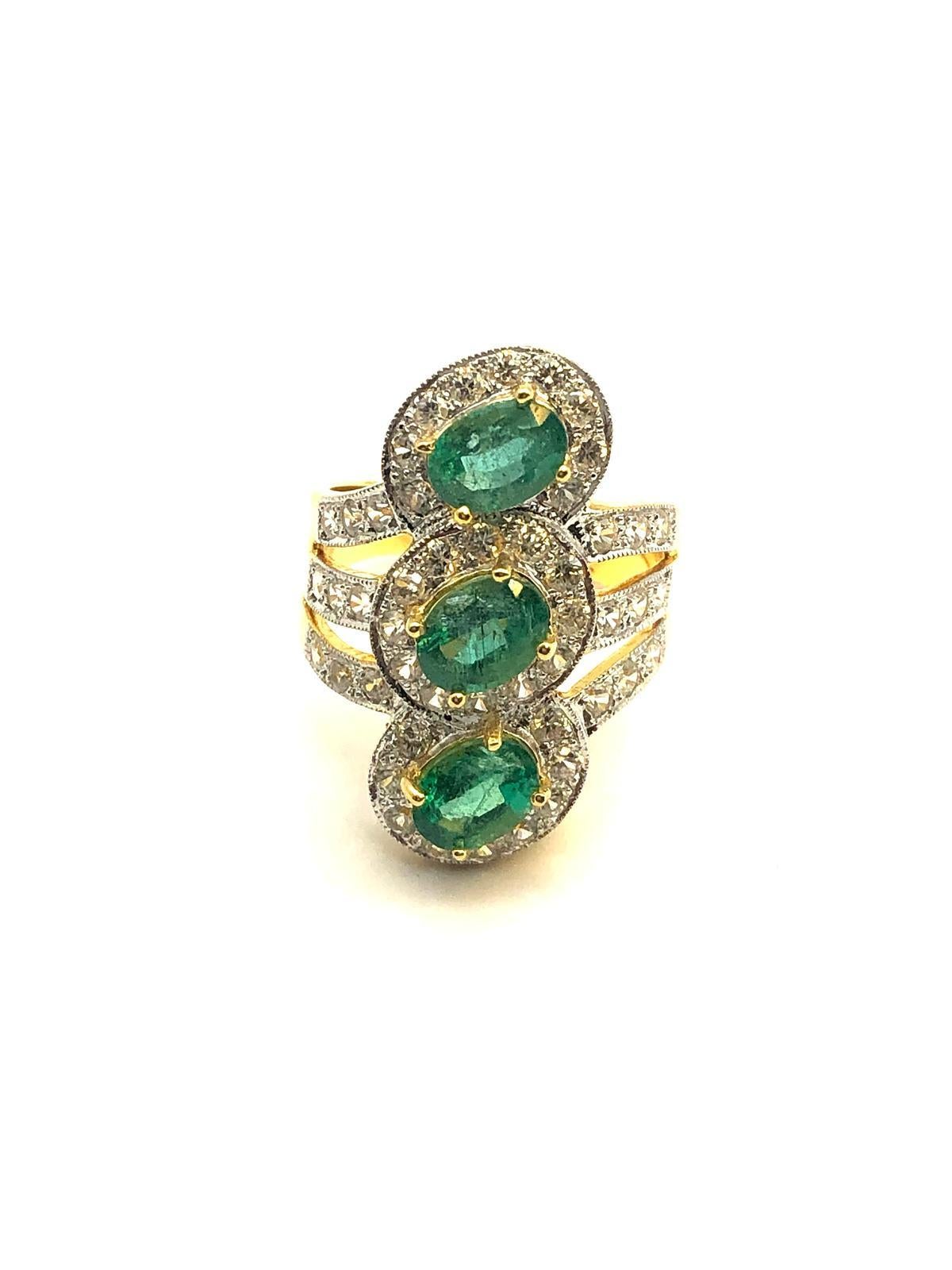 Bochic “Orient” Natural Emerald & Topaz Cocktail Ring Set In 18K Gold & Silver 

Natural Round Brilliant Emeralds  - 3.00 Carat 
Natural White Topaz - 2.00 Carat 

This Ring is from the 