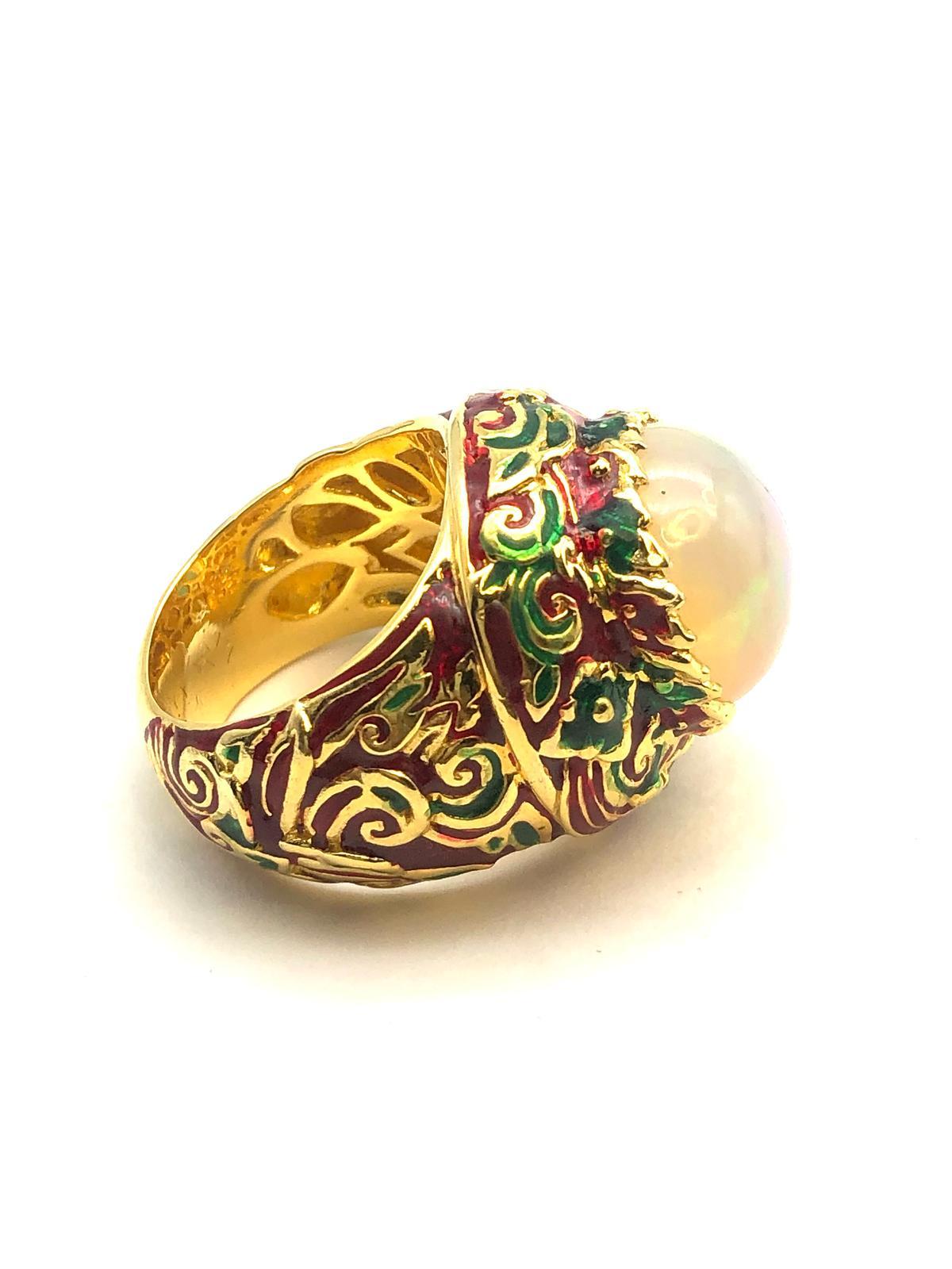 Bochic “Orient” Natural Fire Opal & Hand Enamel Ring Set In 18K Gold & Silver 

Natural Fire Opal - 9.50 Carat 

This Ring is from the 
