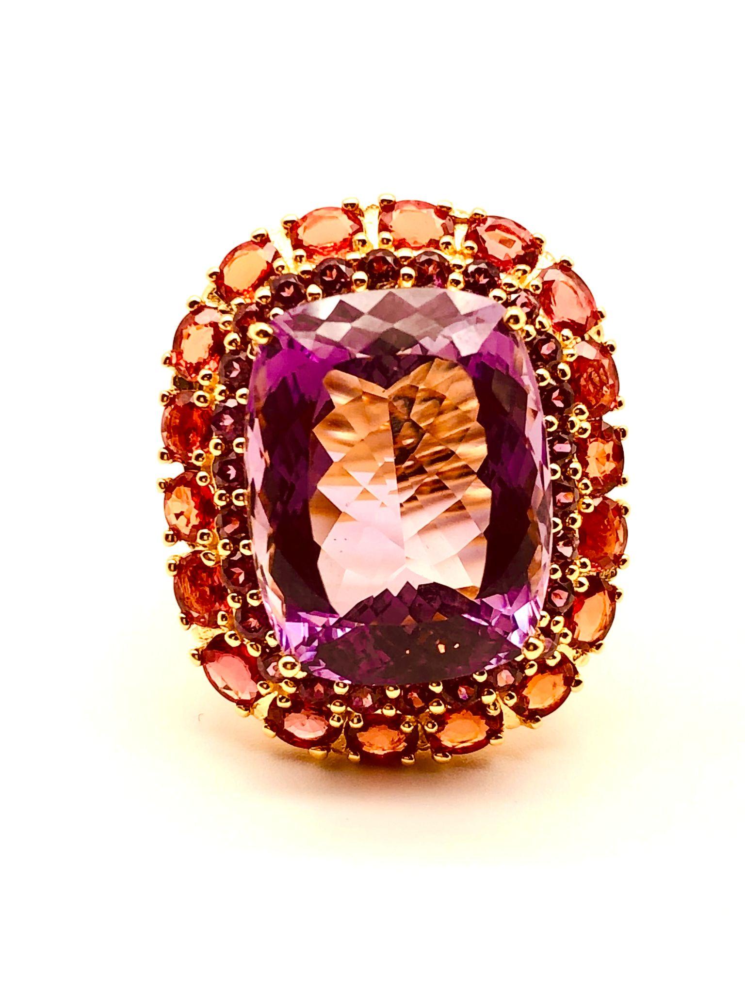 Bochic “Orient” Natural Orange Sapphire & Amethyst Ring Set  18K Gold & Silver

Natural Oval Shape Amethyst - 15.50 Carat 
Natural Orange Sapphire - 4.00 Carat 

This Ring is from the 