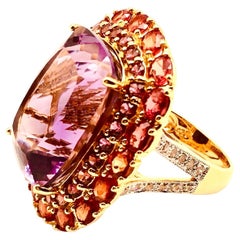 Anillo Bochic "Orient" de zafiro naranja natural y amatista  Oro y plata de 18 quilates