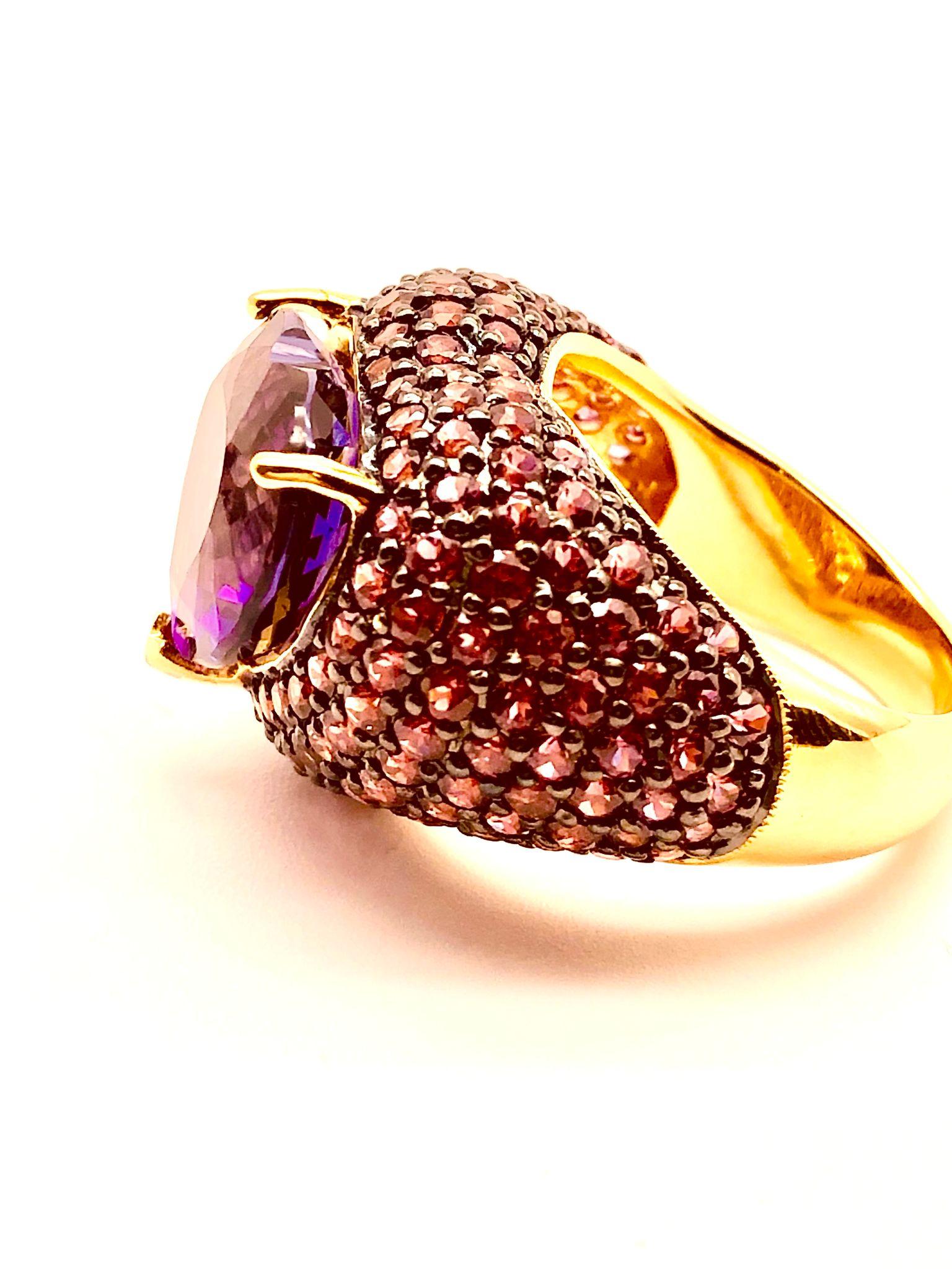 Bochic “Orient” Natural Pink Sapphire & Heart Shape Amethyst Ring Set  18K Gold & Silver

Natural Oval Shape Amethyst - 7.50 Carat 
Natural Pink Sapphire - 4.00 Carat 

This Ring is from the 