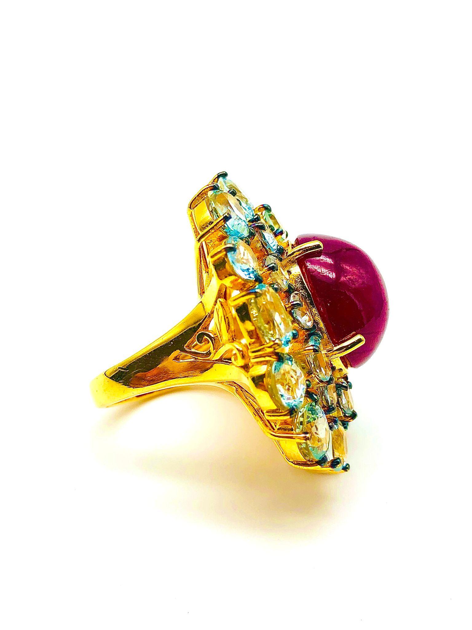 Bochic “Orient” Natural Ruby & Aquamarine Ring Set In 18K Gold and Silver 

Natural Ruby  - 8.00 Carat 
Natural Round Brilliant Multi Color Aquamarine
14.00 Carat 

This Ring is from the 