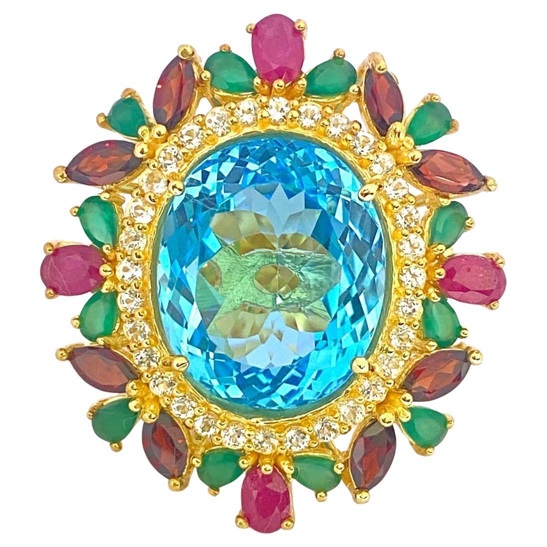 Anello Bochic "Orient" con rubino naturale, granato e smeraldo in oro e argento 18 K.