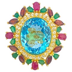 Anillo Bochic "Orient" de rubí natural, granate y esmeralda engastado en oro de 18 quilates y plata