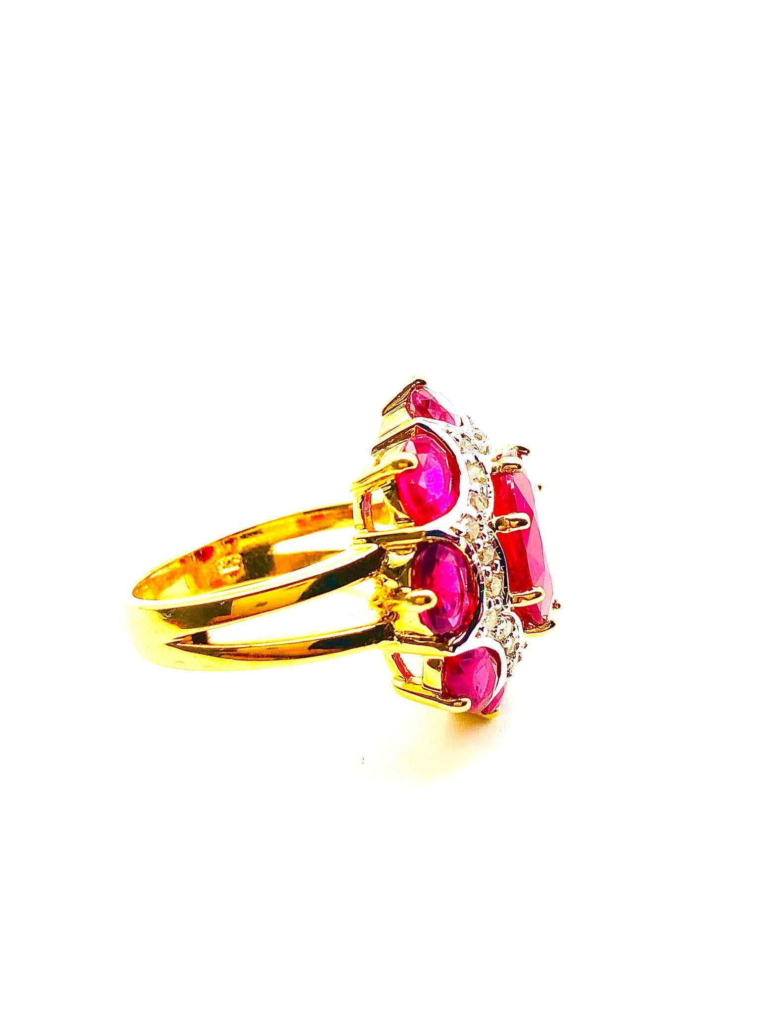 Bochic “Orient” Natural Ruby & Natural Diamond Ring Set In 18K Gold & Silver 

Natural Oval Shape Center Ruby
8.00 Carat 
Natural Oval Brilliant  and Multi Rubies
9.00 Carat 
Natural Diamonds 
1.00 Carat 

This Ring is from the 