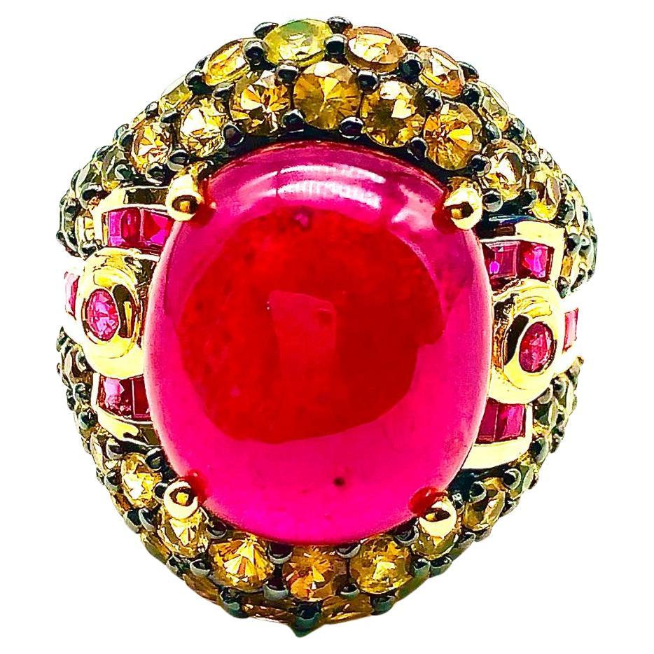 Anello Bochic "Orient" con rubino naturale e zaffiro giallo in oro e argento 18 K.