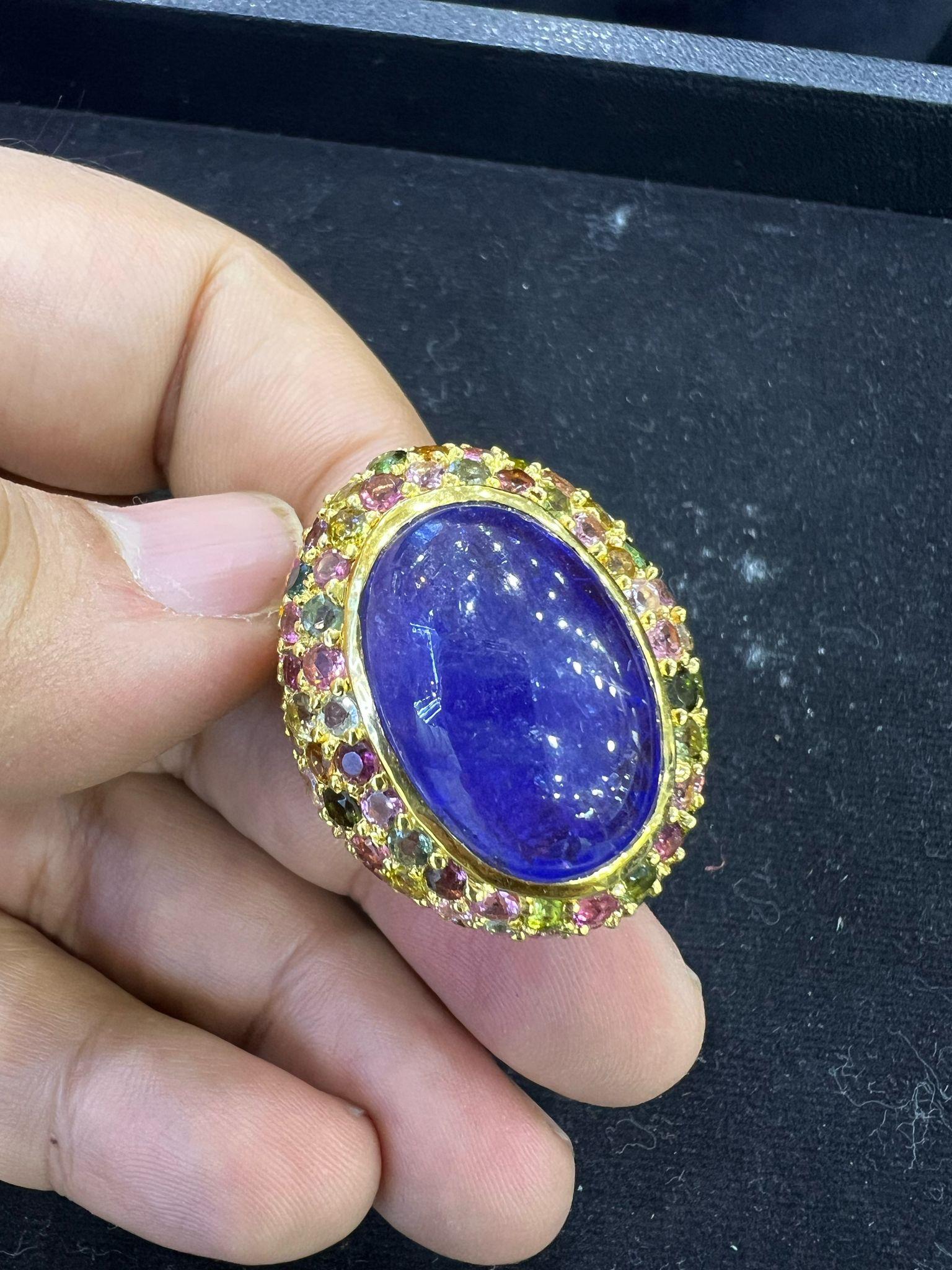 Bochic “Orient” Natural Sapphire & Multi Gem Ring Set In 18K Yellow Gold & Silver 

Natural Cabochon Blue Sapphire - 16 Carat 
Natural multi color Sapphires and Rubies - 3 carat 

This Ring is from the 