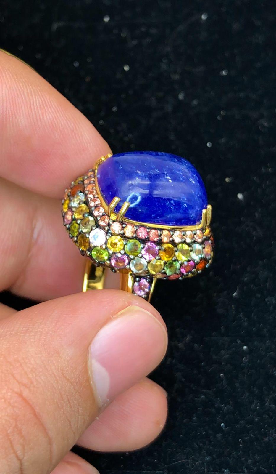 Bochic “Orient” Natural Sapphire & Multi Gem Ring Set In 18K Yellow Gold & Silver 

Natural Cabochon Blue Sapphire - 16 Carat 
Natural multi color Sapphires and Rubies - 3 carat 

This Ring is from the 