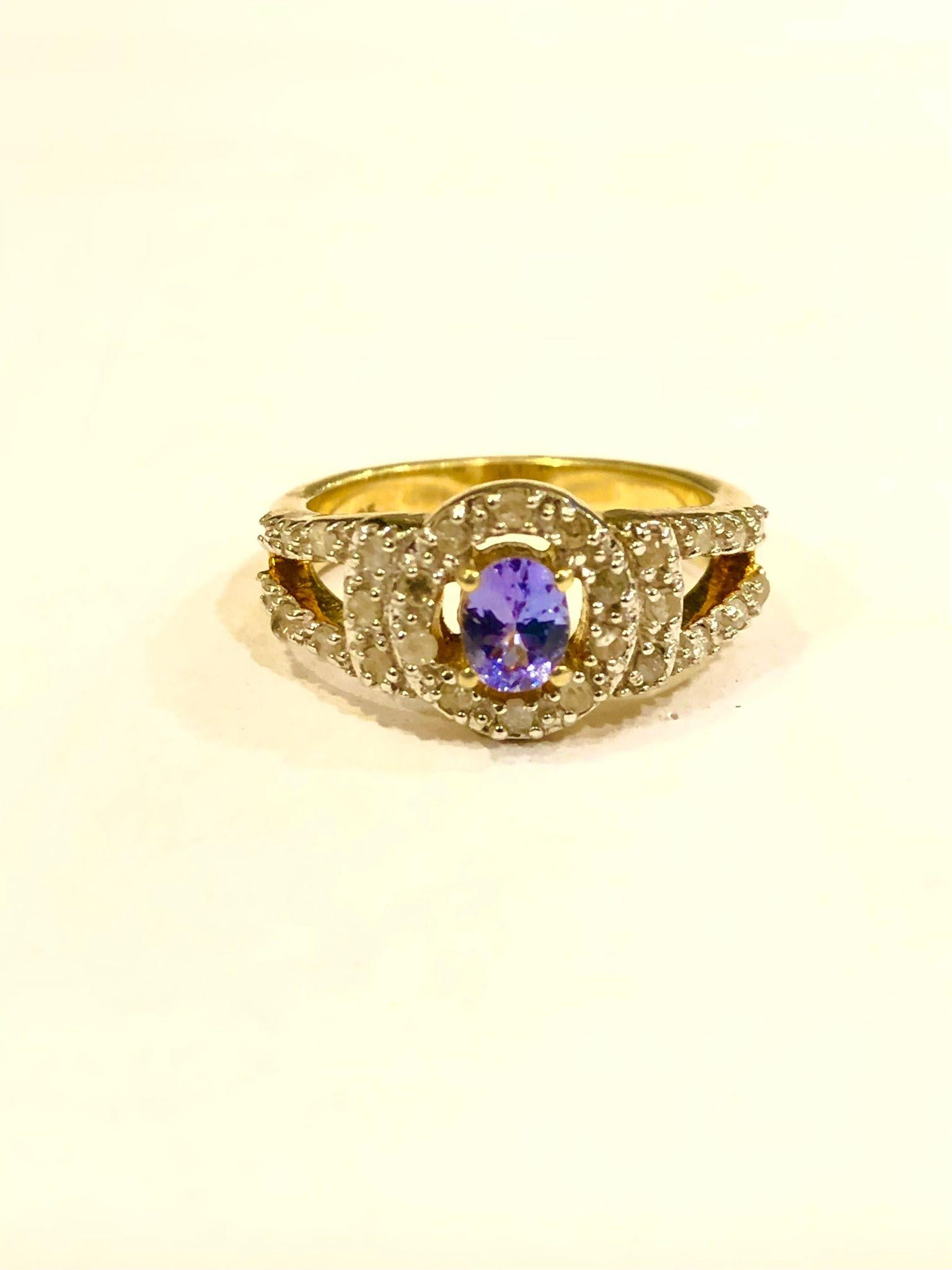 Bochic “Orient” Natural Tanzanite & Diamond  Ring Set In 18K Yellow Gold & Silver

Natural Tanzanite 1.50 carat 
Natural Diamonds - 1 carat

This Ring is from the 