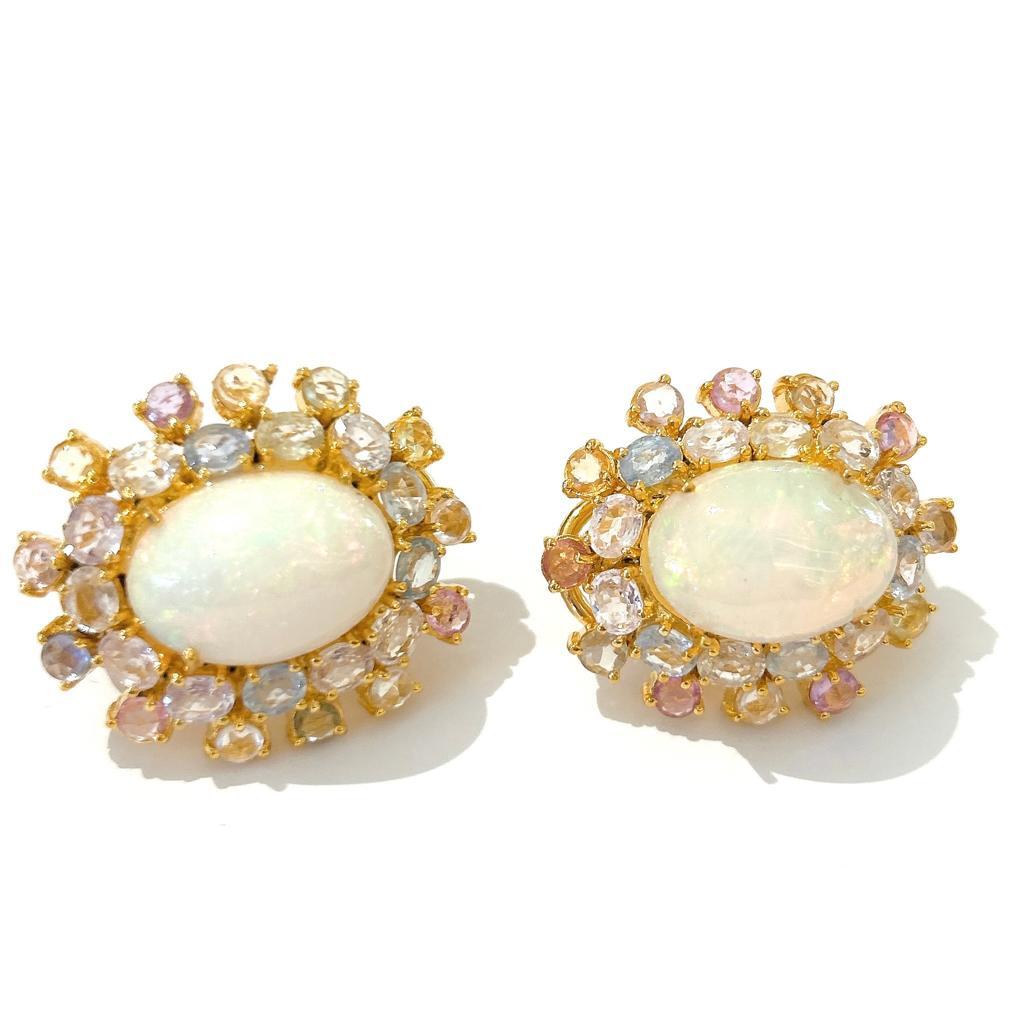 Bochic “Orient” Opal & Multi Sapphire Earrings Set In 18K Gold & Silver 

White Opals, Cabochons shape - 14 Carat 
Multi Color Sapphires From Sri Lanka 
6 Carats 
Pastel colors  

The earrings from the 