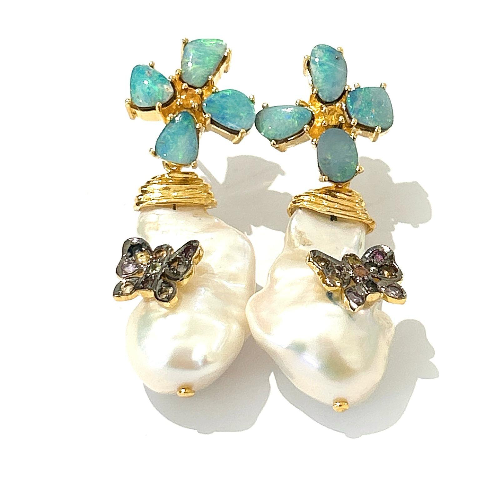 Bochic “Orient” Opal, Ruby & Multi Diamond  Earrings Set 18K Gold&Silver 

Natural Blue Opal- 3.50 carat 
Natural diamonds  - 1 carat 
Yellow sapphires - 0.50 carat 

The earrings from the 