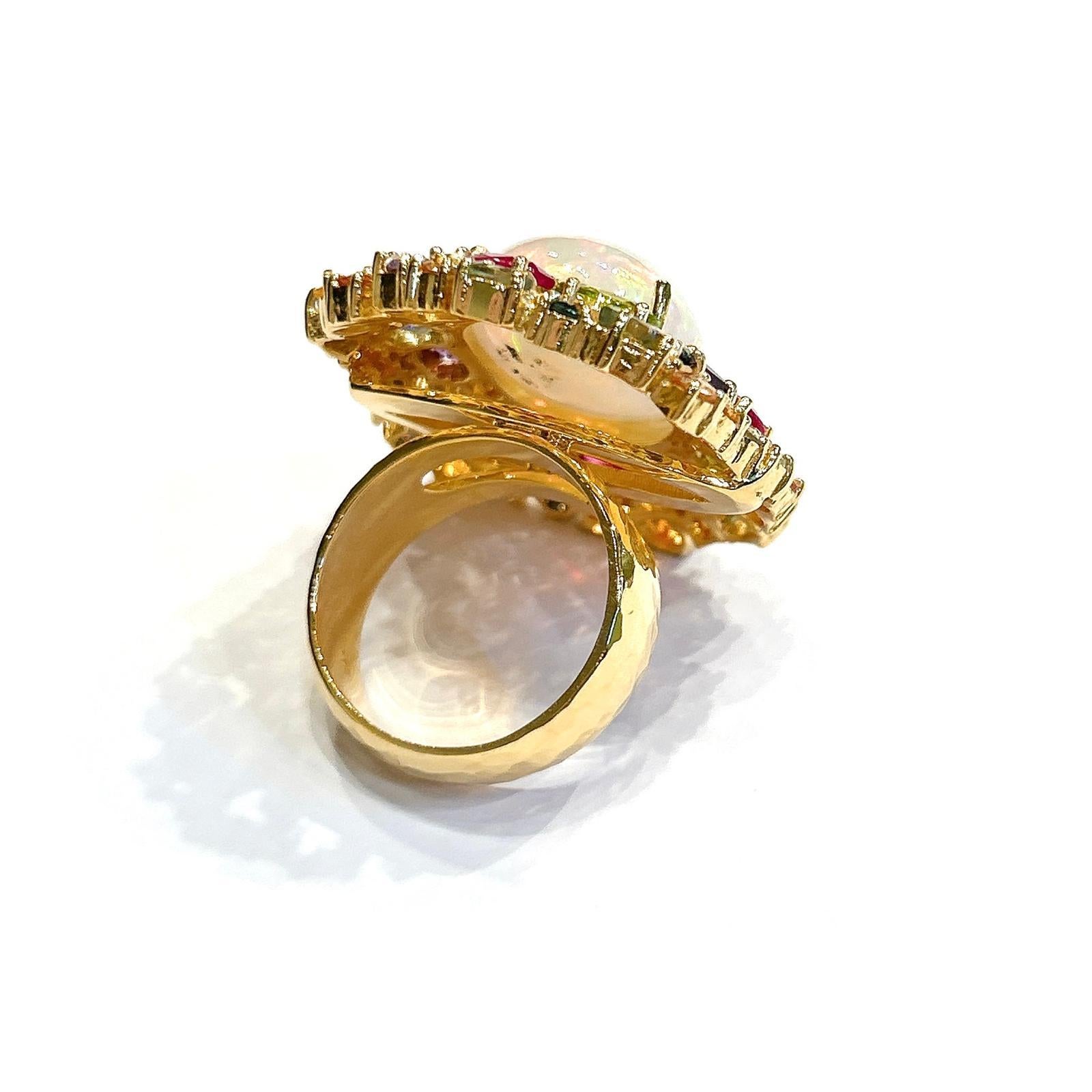 Bochic “Orient” Opal, Ruby & Sapphire Ring, Set 18K In Yellow Gold & Silver

Natural Fire Opal - 10  carats 
Natural Amethyst, Peridot, Ruby and White Topaz 
5 carats
Natural Sapphire - 3 CArat 
22.3 gram 

This Ring is from the 